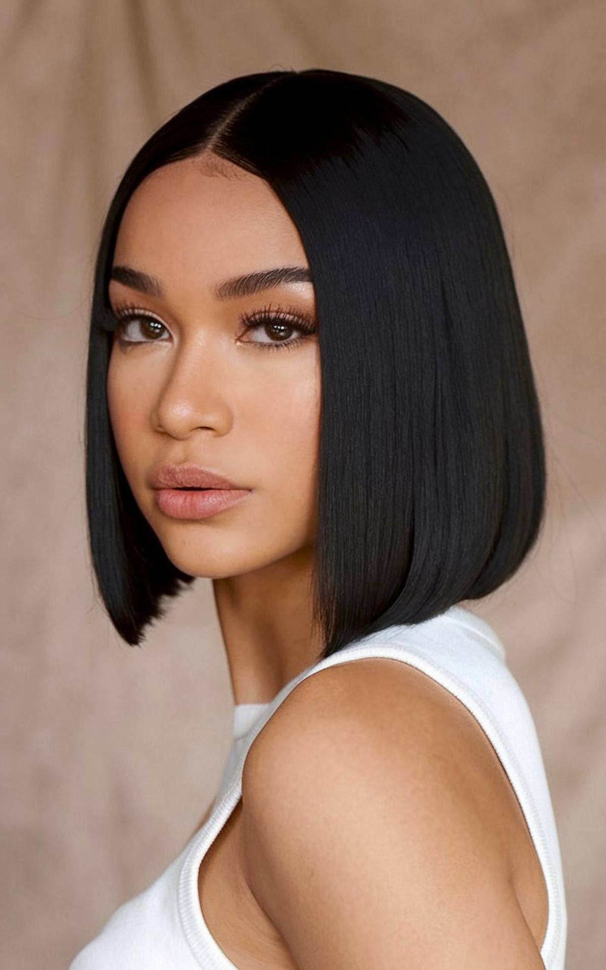 Silk press short bob with middle part and smooth glossy finish