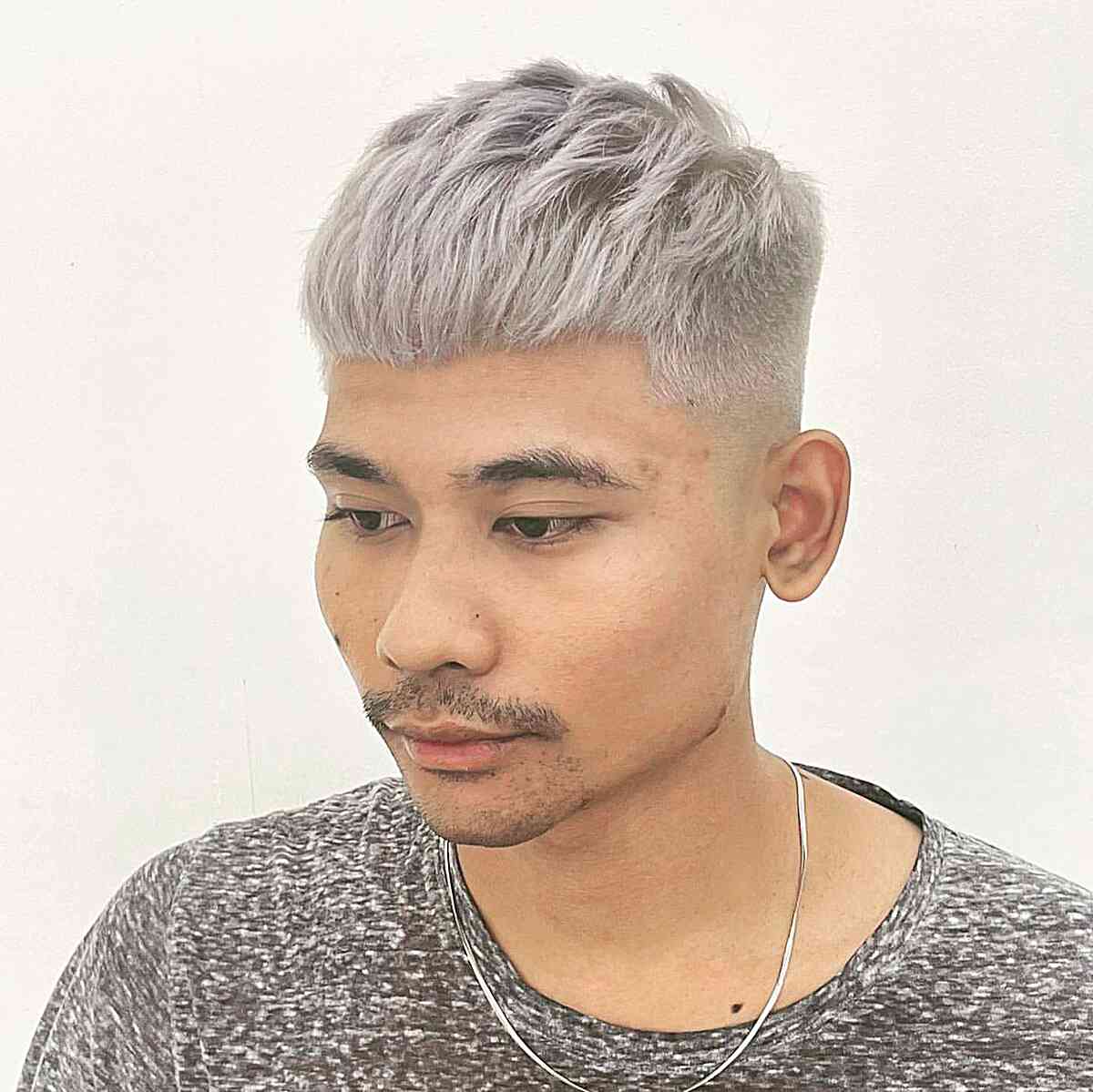 Silver Blonde on Tapered Messy French Haircut for men