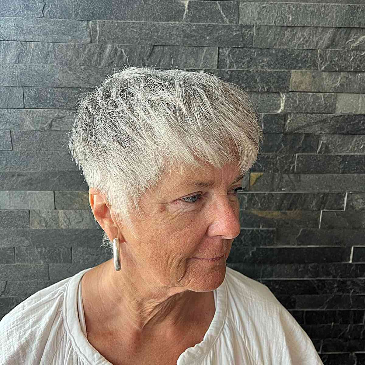 Silver Gray Wispy Pixie Cut for 60-Year-Olds with short hair