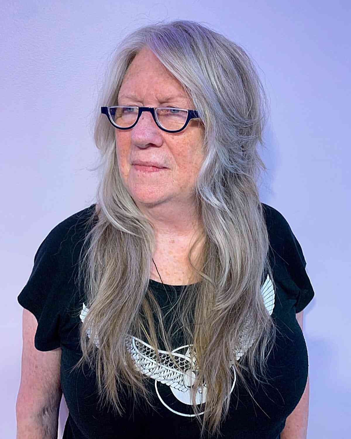 Silver Soft Shag with Long Layers for Women Over 60 with Glasses