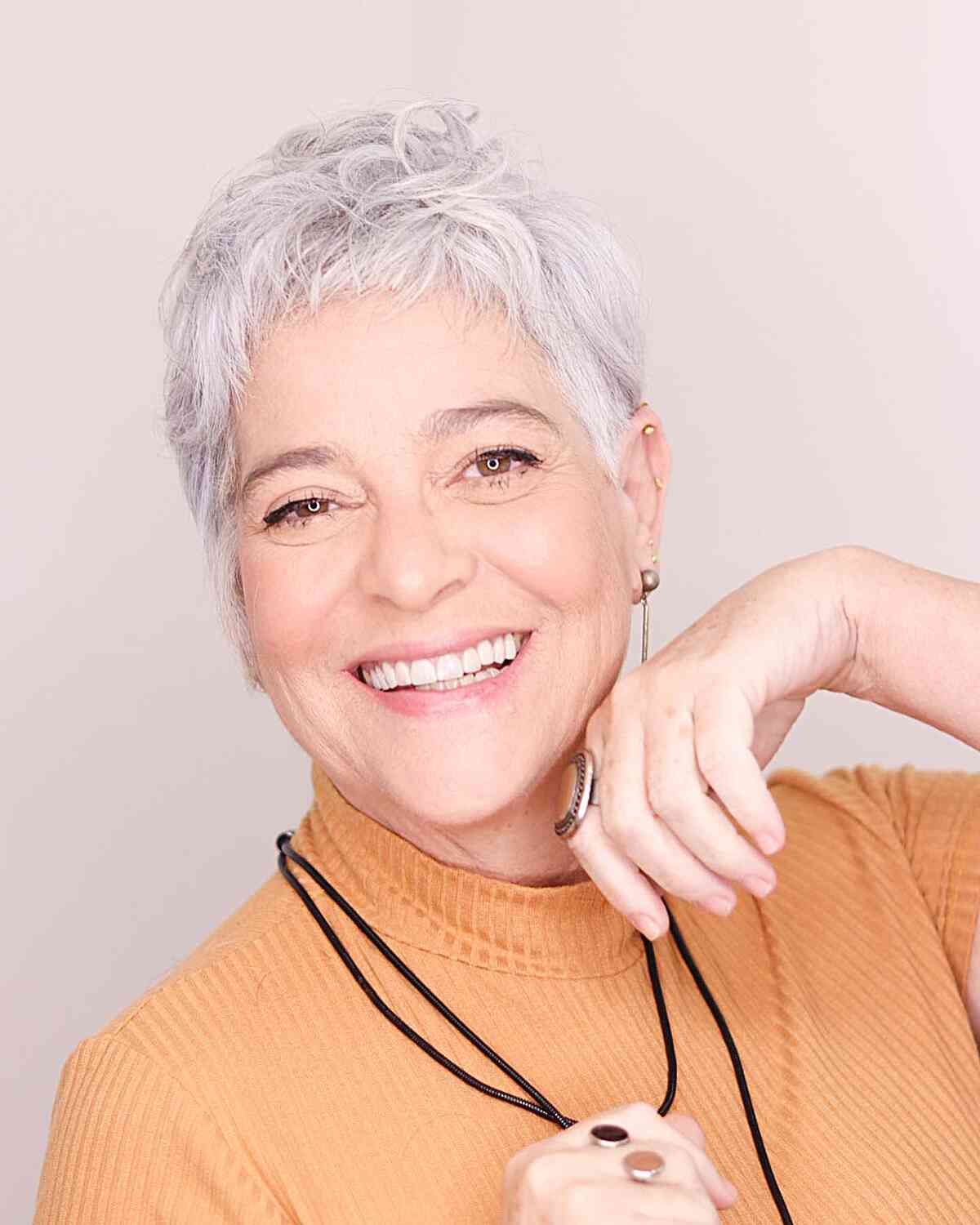 Silver-White Messy Textured Pixie for Older Women with an oval face