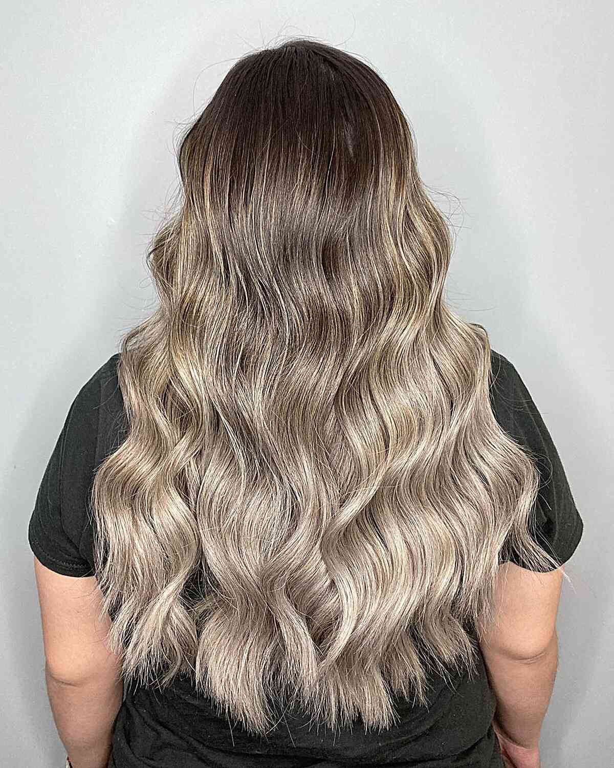 Silvery Icy Blonde Balayage Ombre for Long-Length Waves