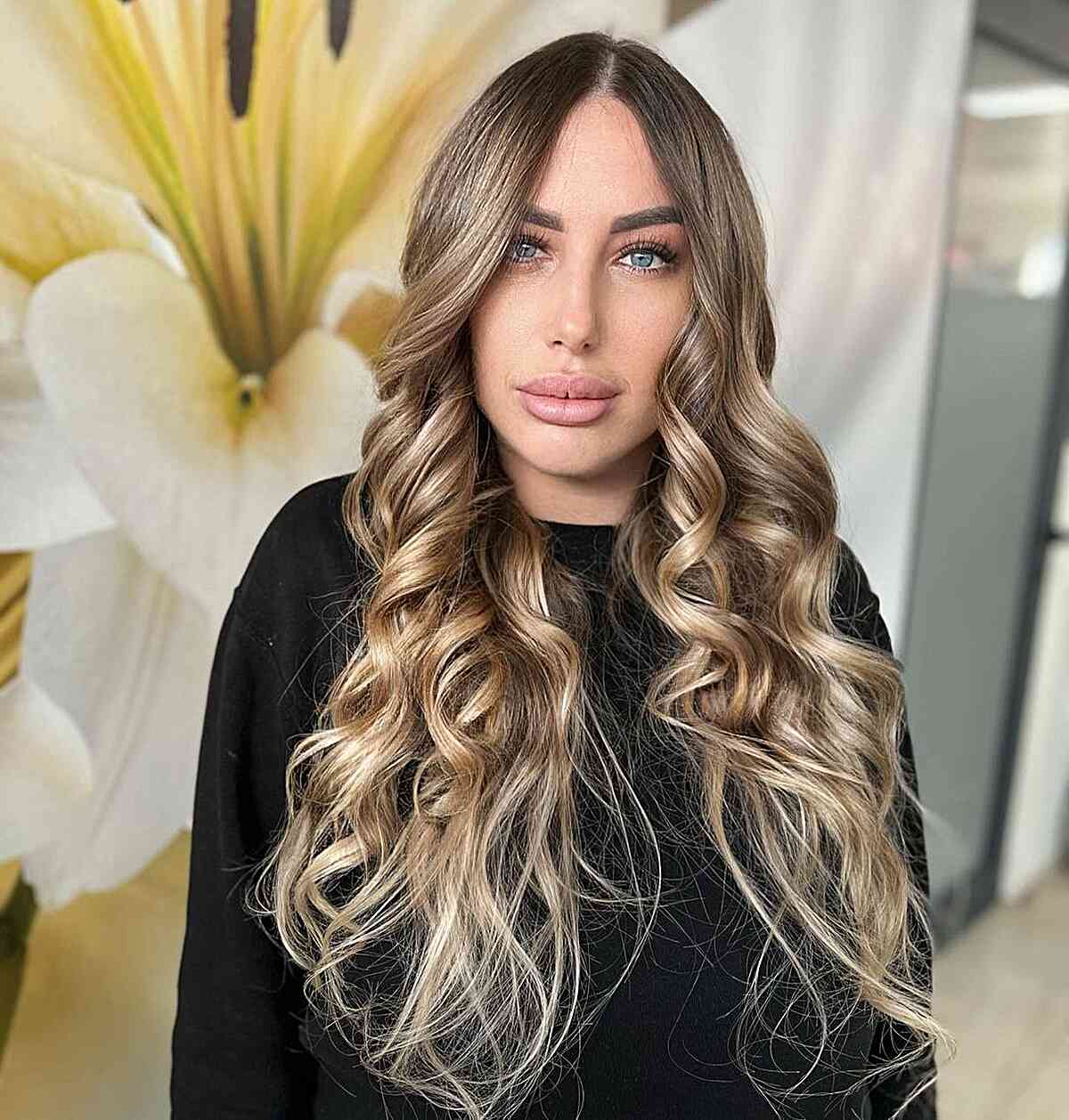 Simple Balayage on Long Hair with wispy ends and curled mid-lengths