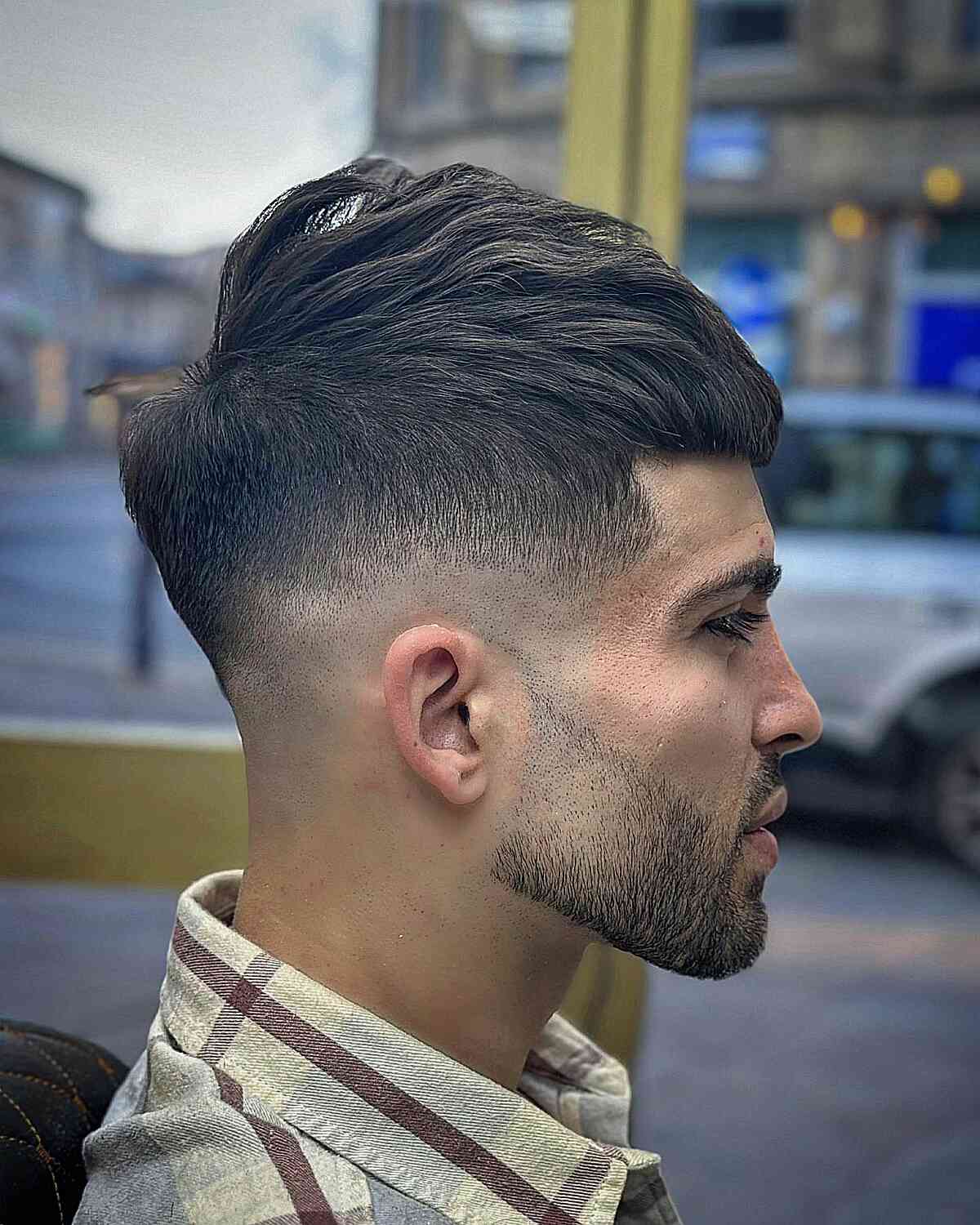 Simple drop fade cut for men with thicker hair and a beard fade