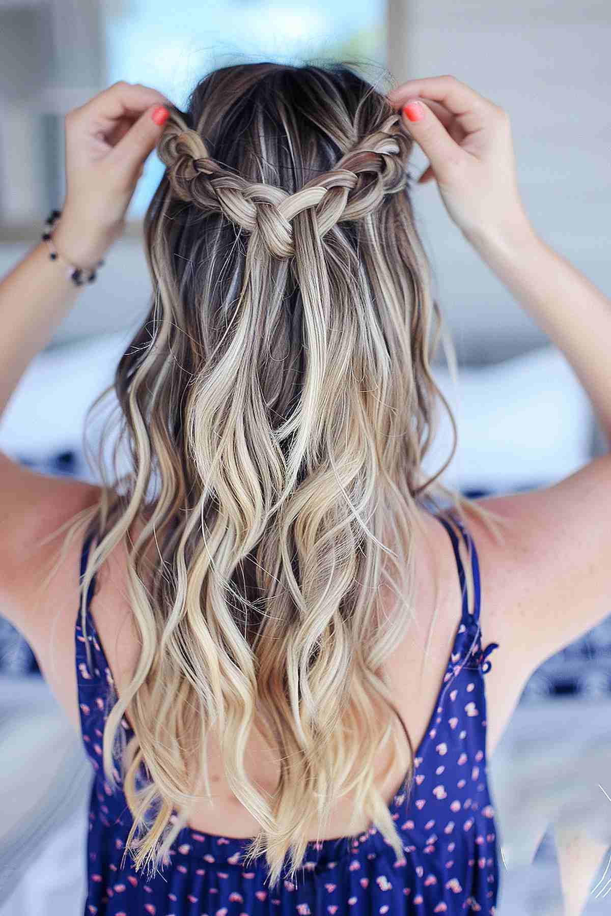 Simple half-up braid for beach waves with natural texture