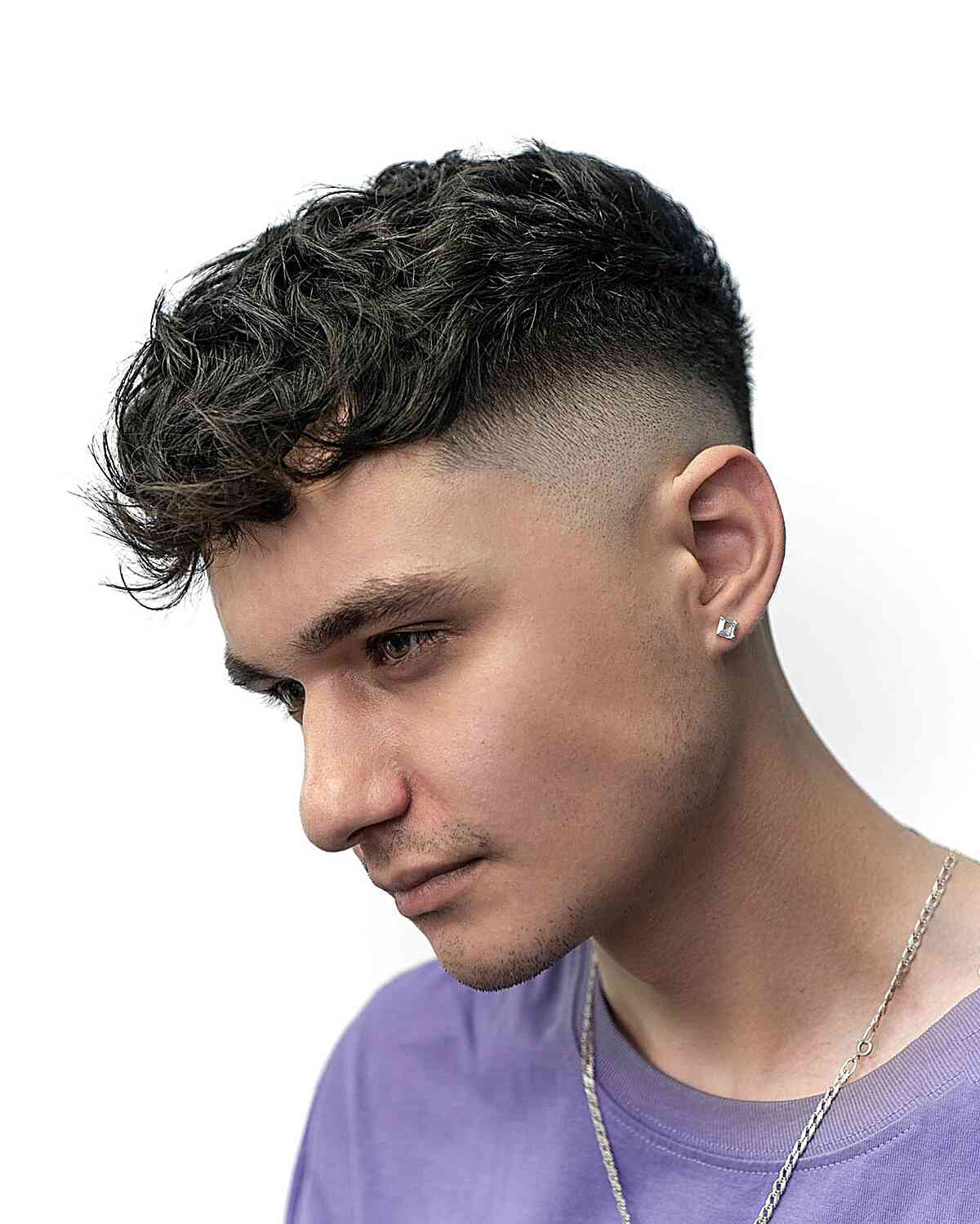 Simple Messy Top and High Fade for men with thicker hair