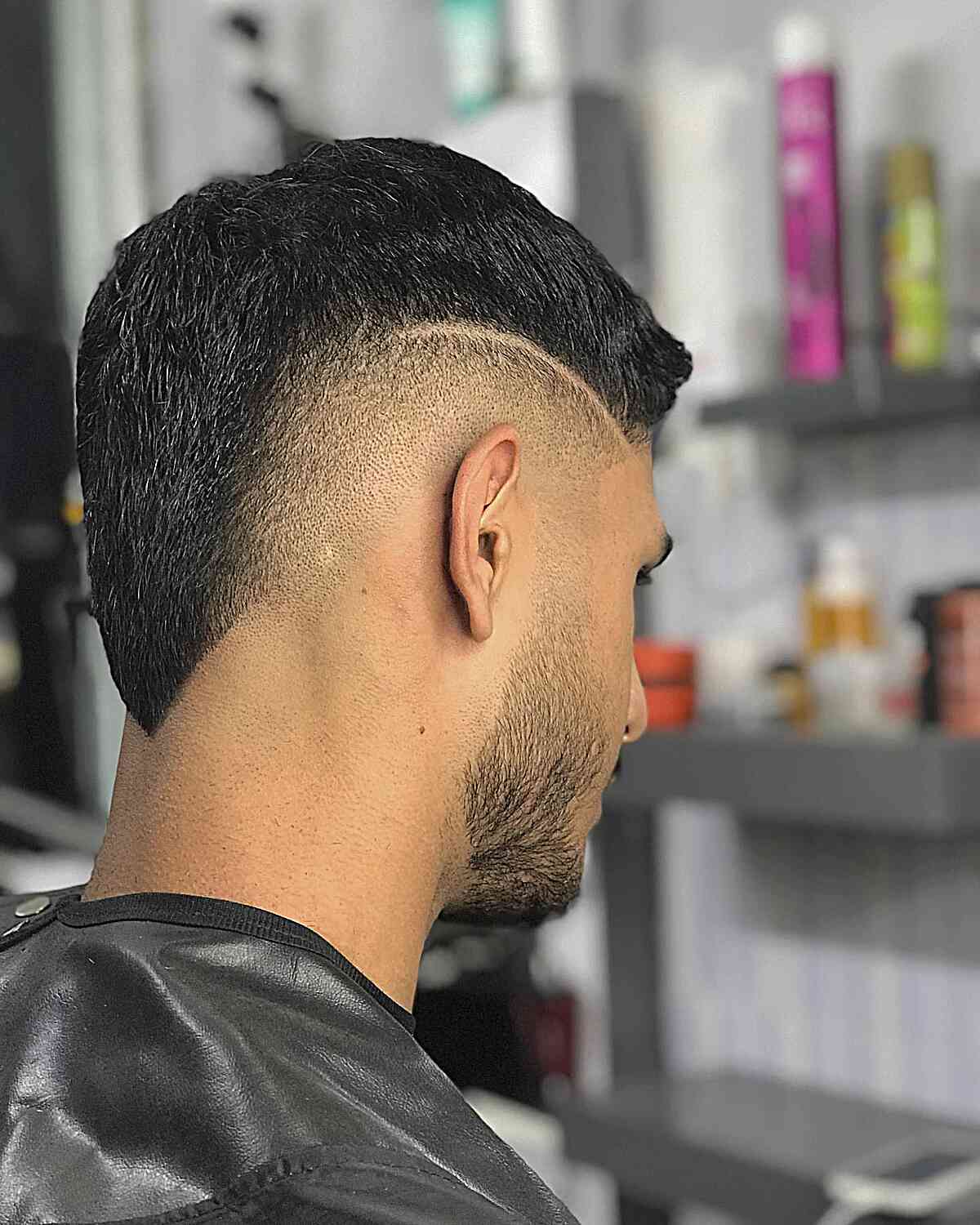 Skin Burst Fade with Design on Guys with Thick Hair