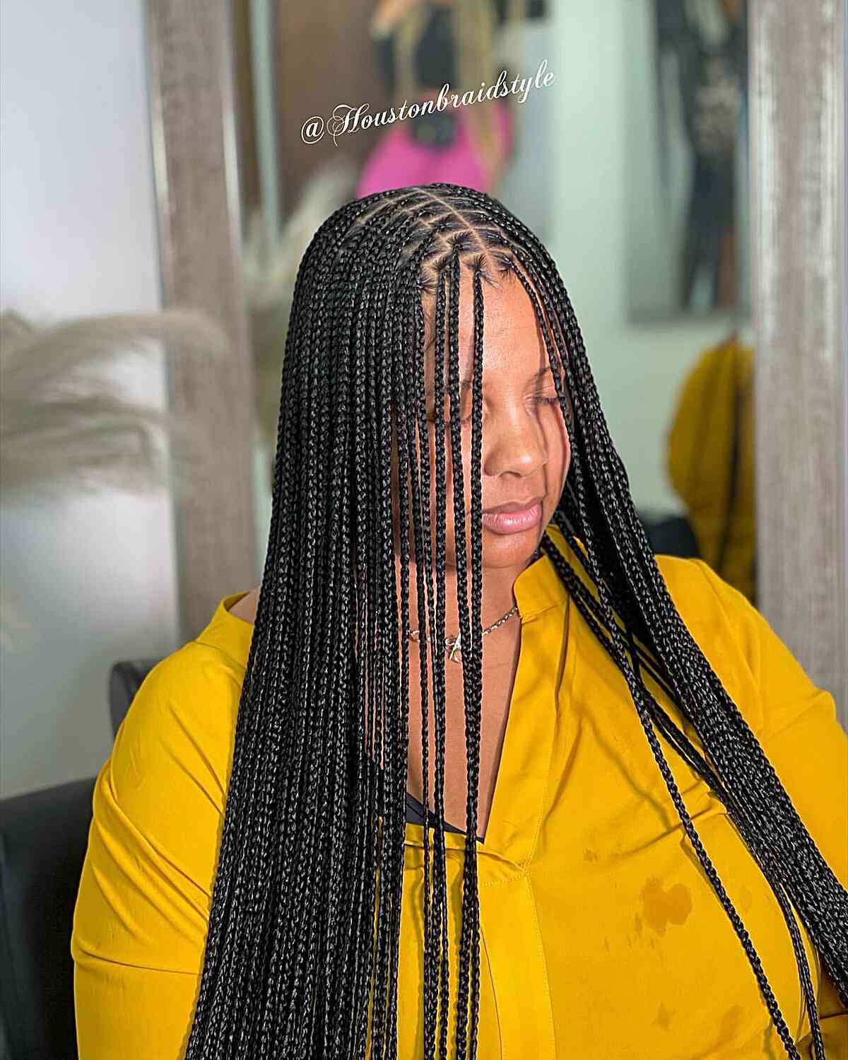 Sleek and Long Small Knotless Box Braids with Center Part