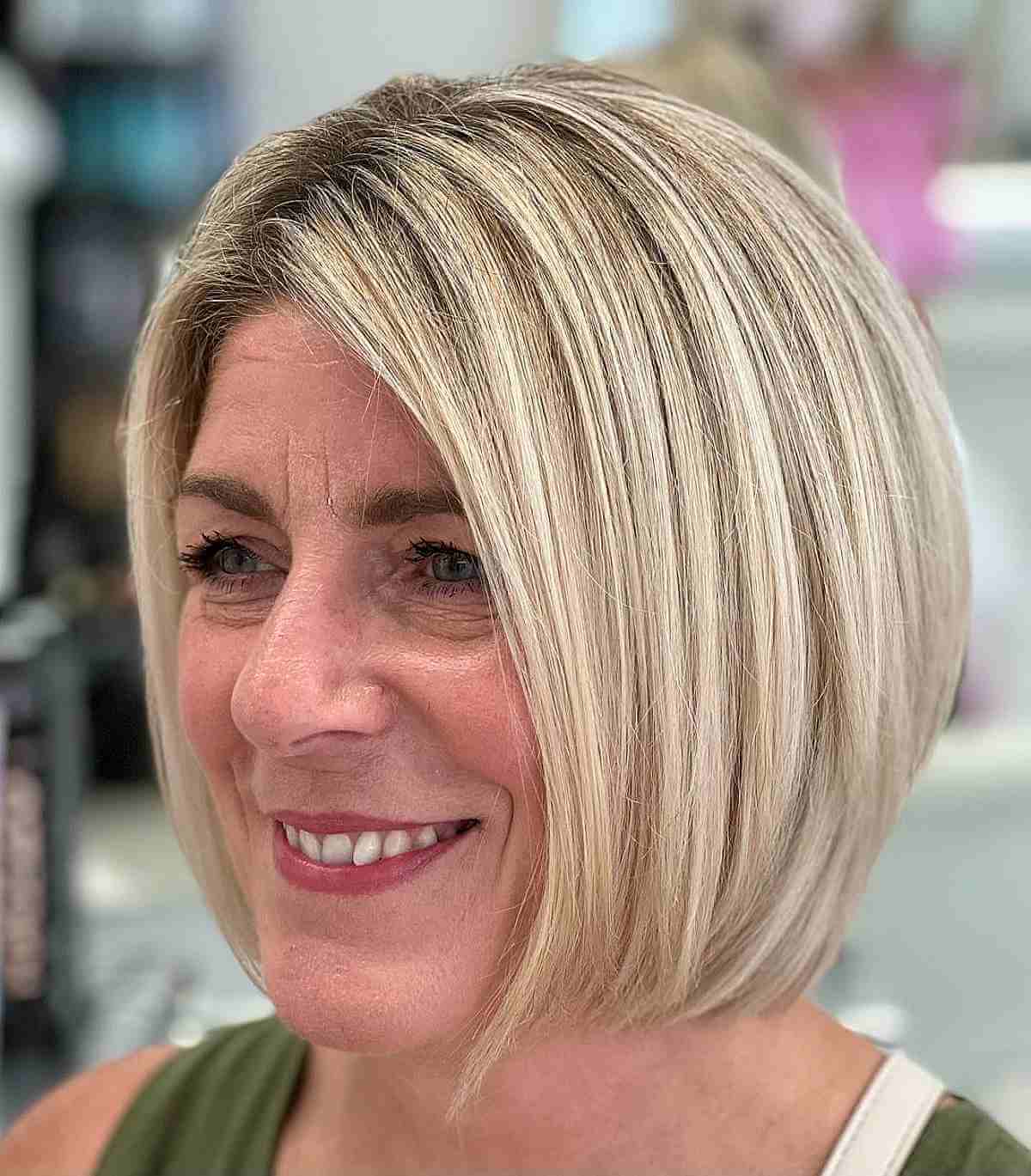 Sleek Blonde Hair with Above-the-Shoulders Cut for Older Women