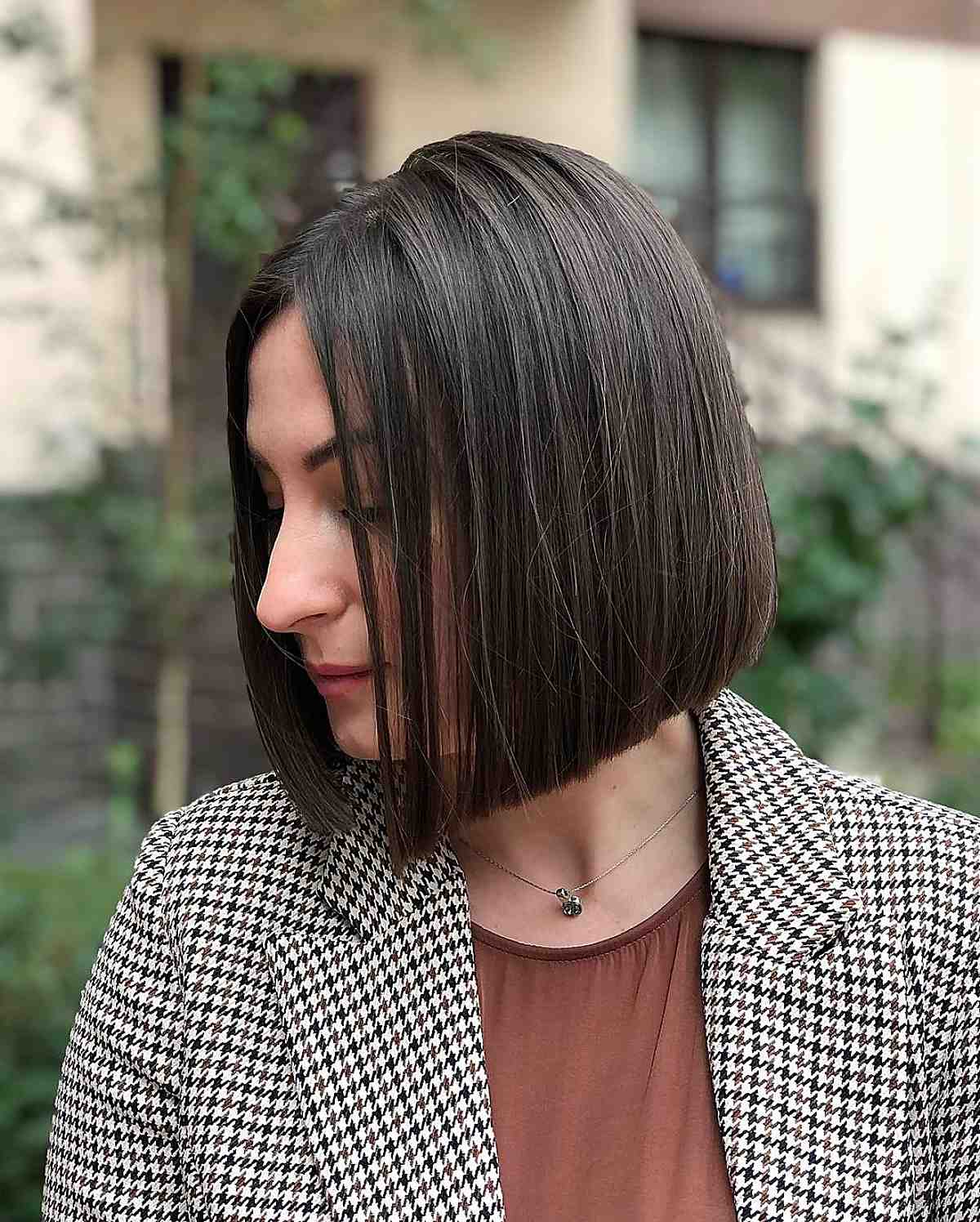 52 Best Bob Haircut Trends To Try in 2023 : Brunette Bob + Bangs