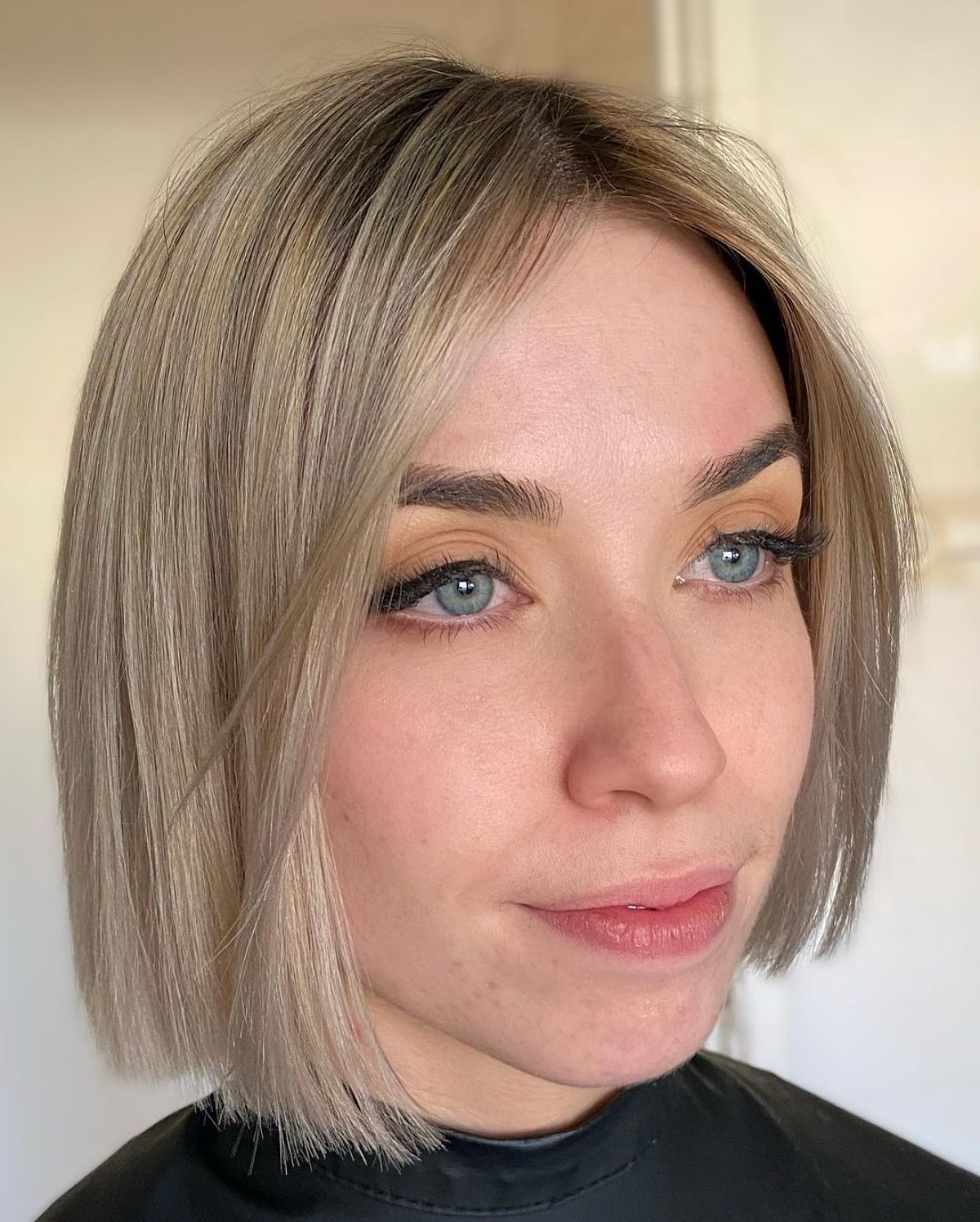 Sleek Blunt Bob with a Middle Part