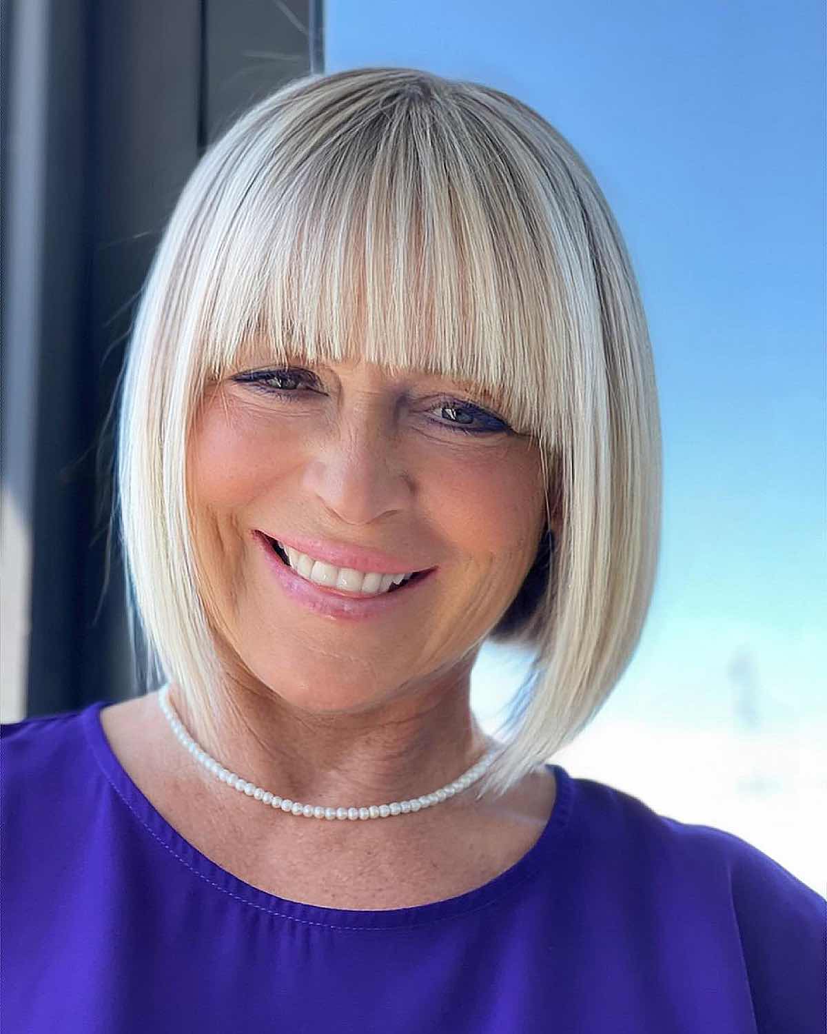 sleek bob with bangs for 50-year-olds