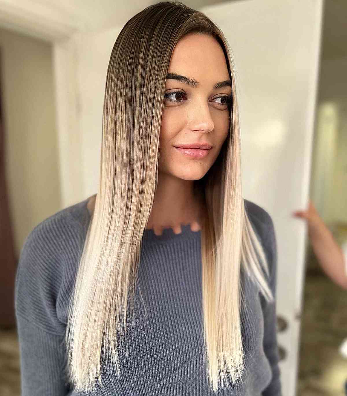 Sleek Brown Roots to Blonde Ends Hairstyle