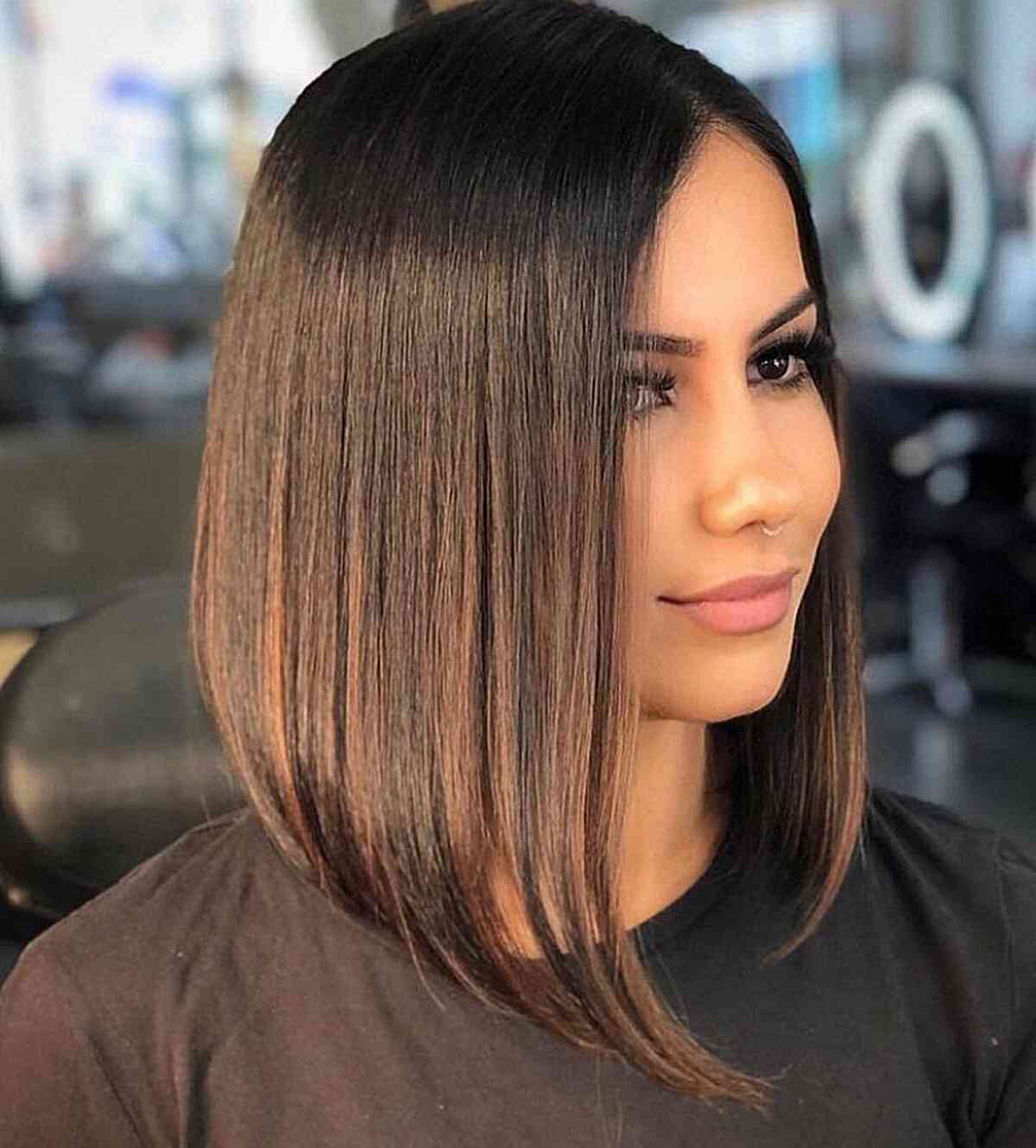 Sleek Graduated Lob Hairstyle with Subtle Highlights