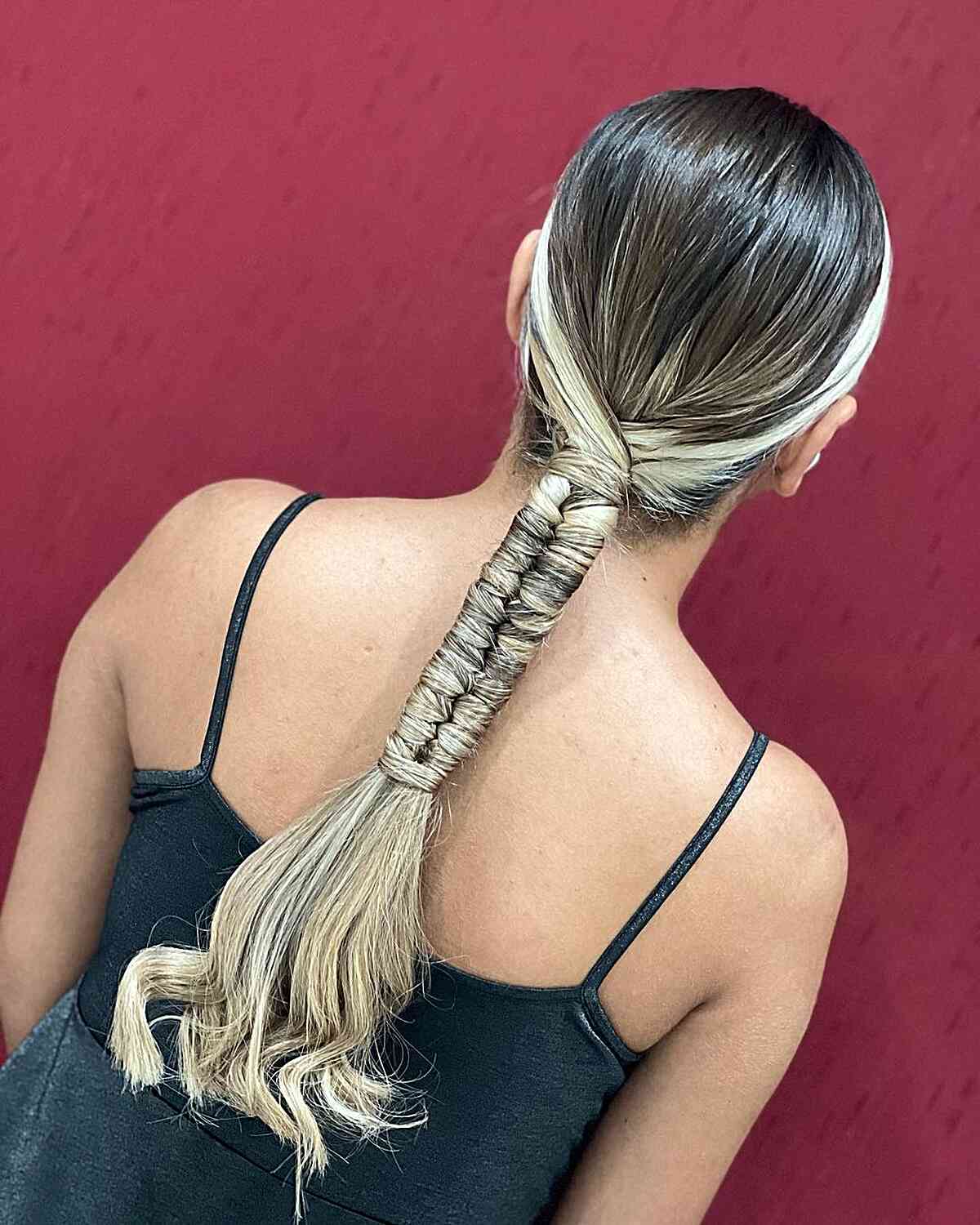 Sleek Low Ponytail with Infinity Braid for Girls Playing Volleyball