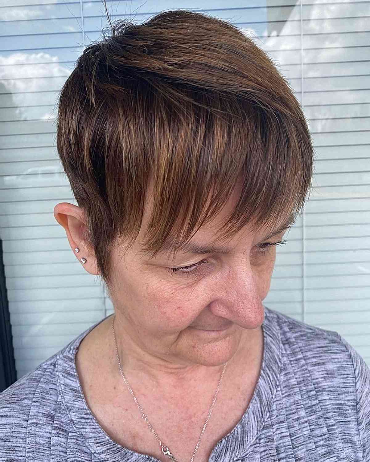 Sleek Pixie with Bangs for a 70-Year-Old Woman