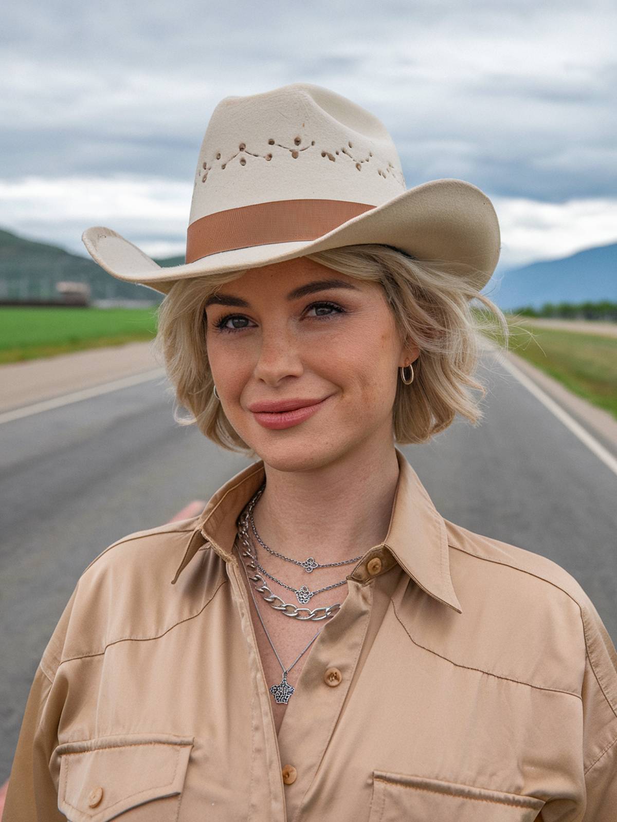 Layered short bob with cowboy hat