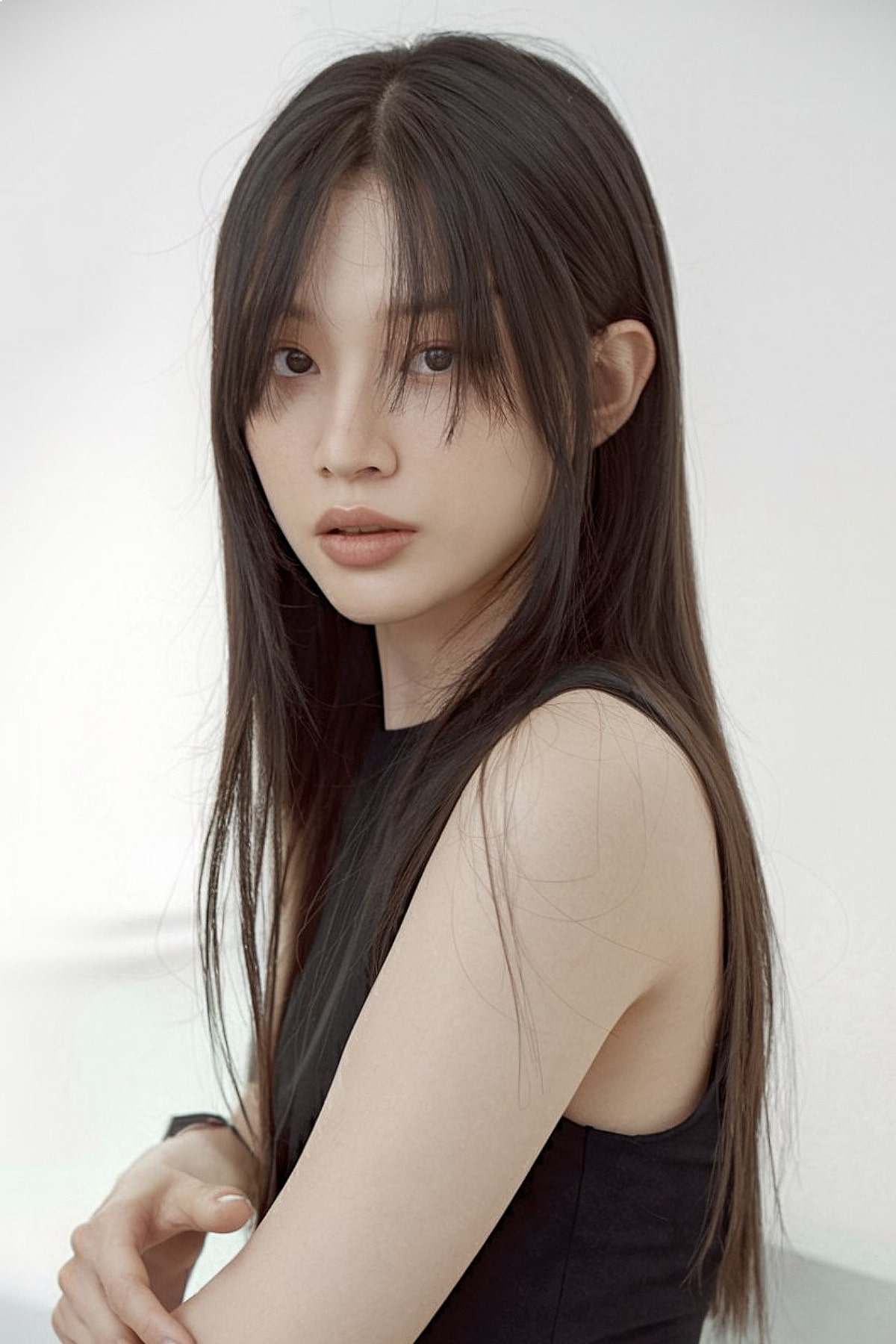 long straight asian hair styled with long bangs