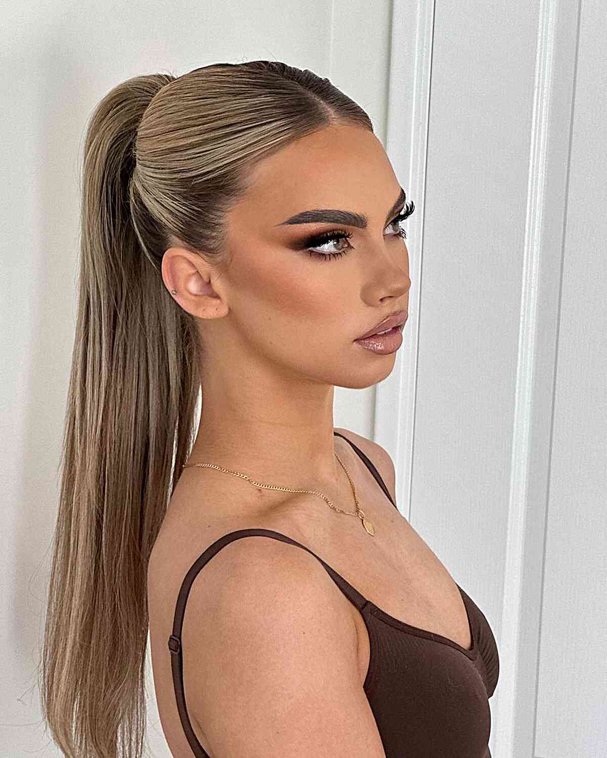 Long Sleek Straight Hair Pony with Middle Part