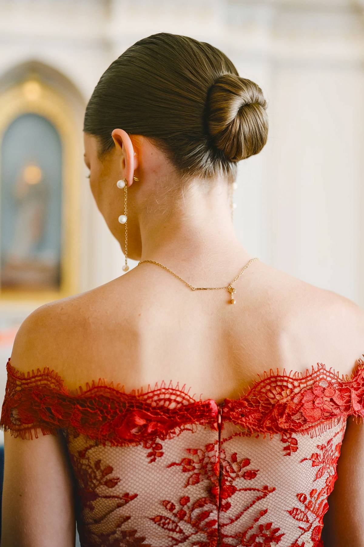 Sleek low chignon wedding updo