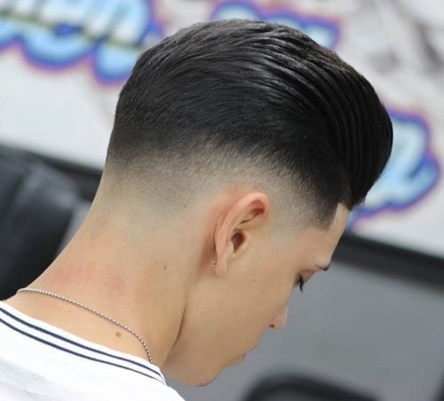 Slick back hair with low skin fade