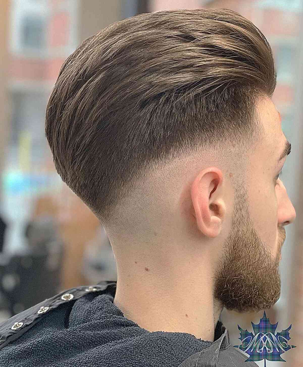 Slicked Back Hairstyle with Mid Drop Fade