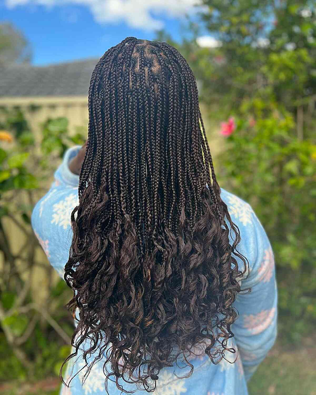 Waist-Length Small Knotless Braids with Voluminous French Curls