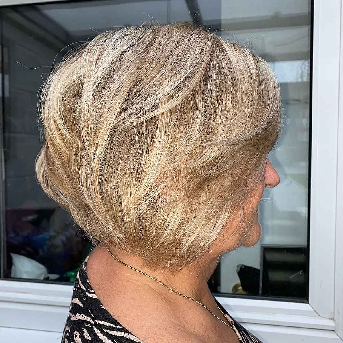 Soft Blonde Bob with Feathered Layers
