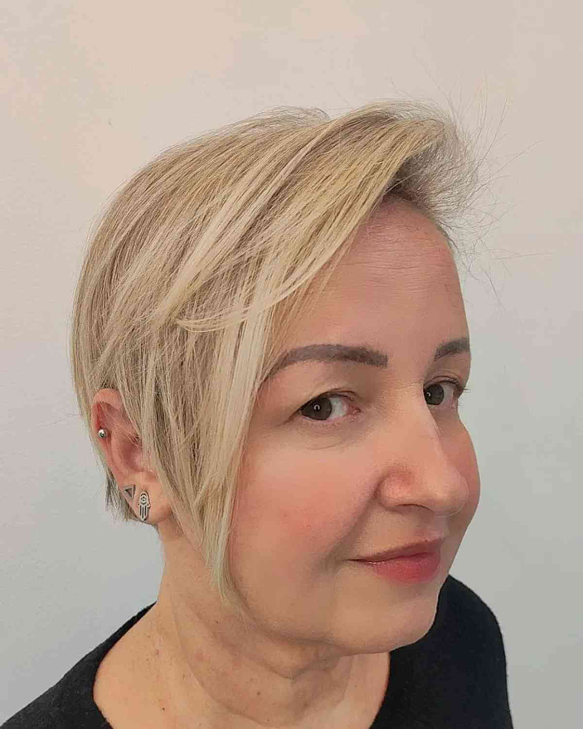 Soft Blonde Long Pixie with a Side Part for Thin Hair