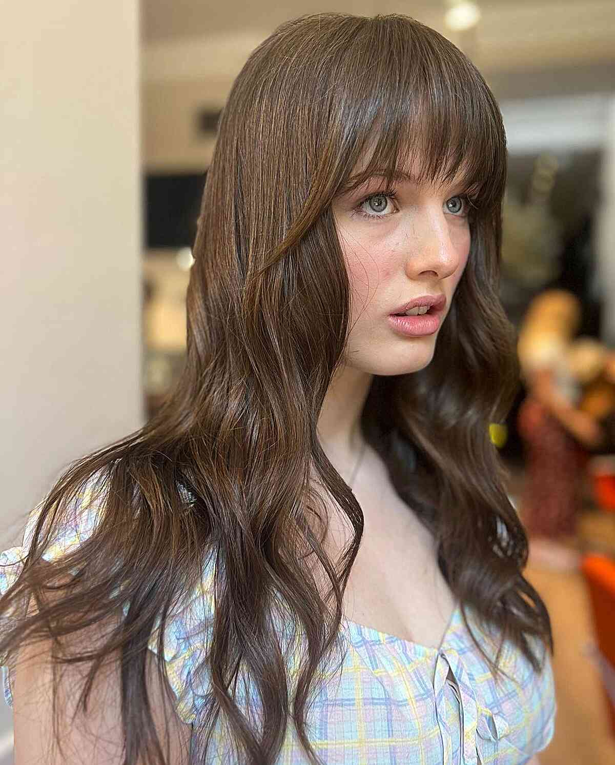 Long-Length Soft Brown Waves with French Razored Bangs