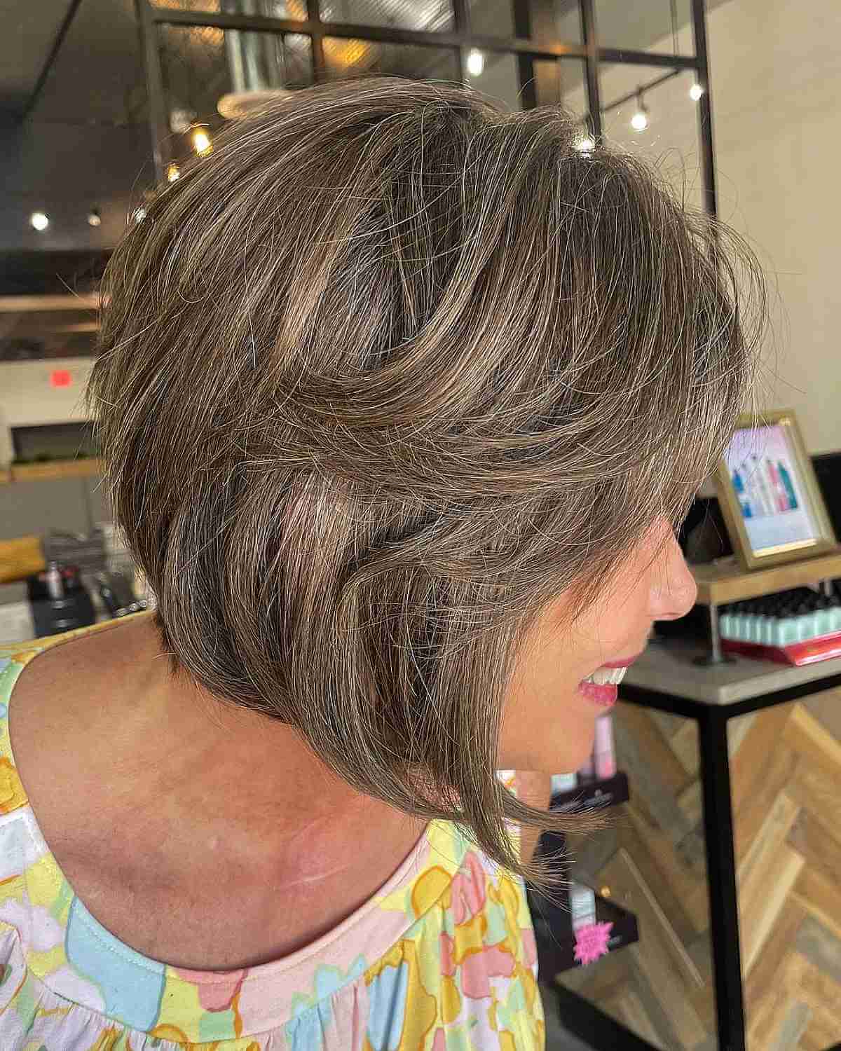 Youthful Inverted Bob with Feathery Layers for an Older Lady