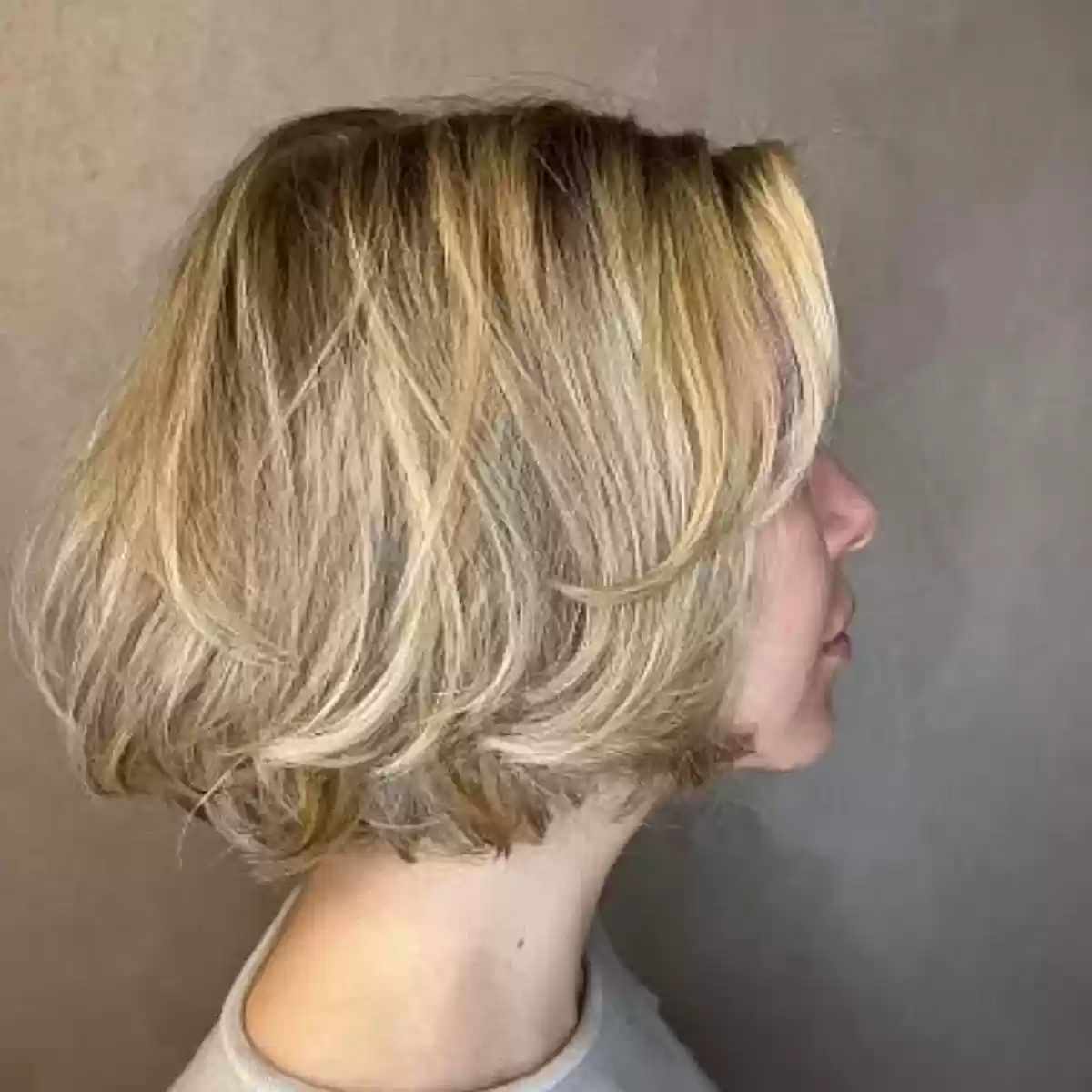 Neck-Length Soft Messy Bob on Rooted Blonde Hair with Fine Layers