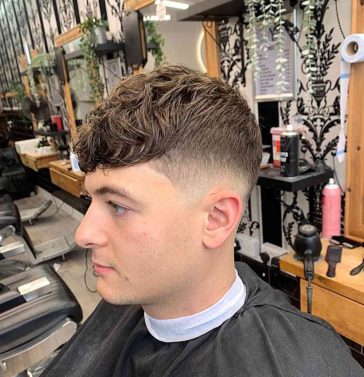 Soft Messy Texture with Fringe and Taper Skin Fade on Young Men with Brown Hair