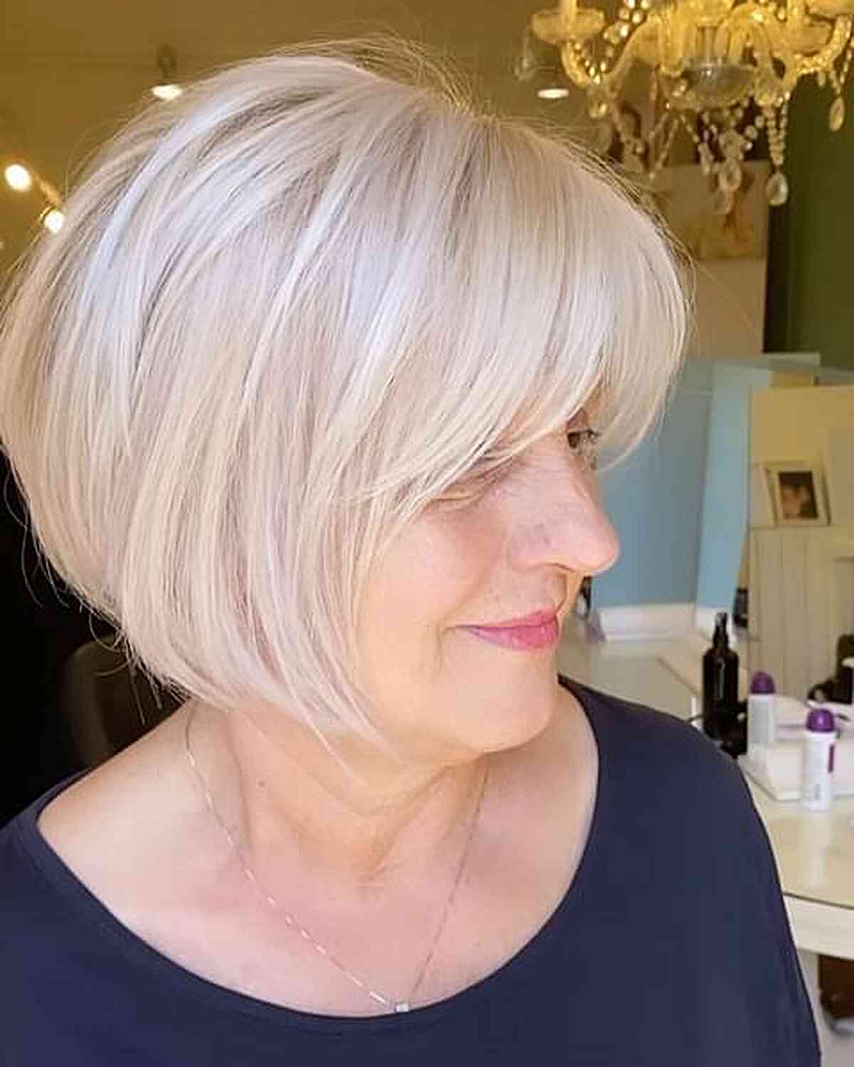 Soft platinum bob with visible layers for ladies aged fifty