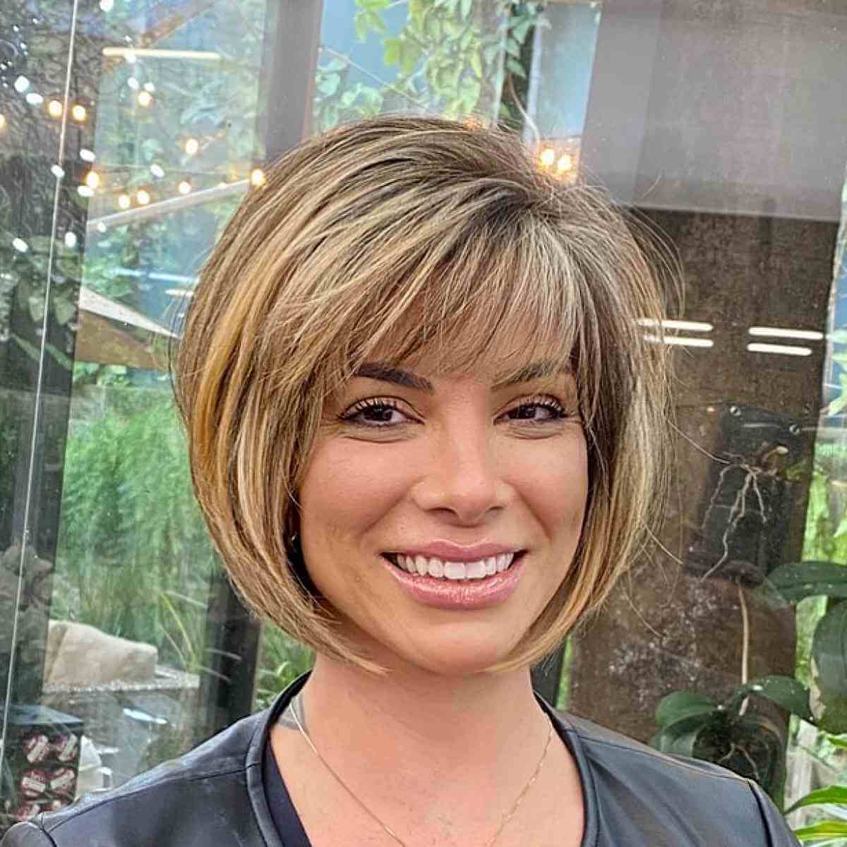 Soft Rounded Blonde Short Bob with Wispy Bangs