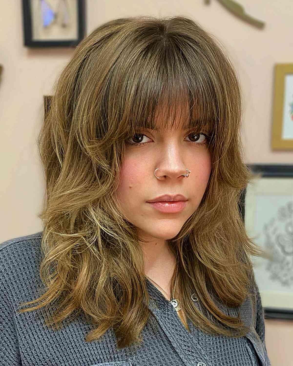 Soft Shaggy Layers and a Wispy Fringe on a messy thick medium-length hairstyle