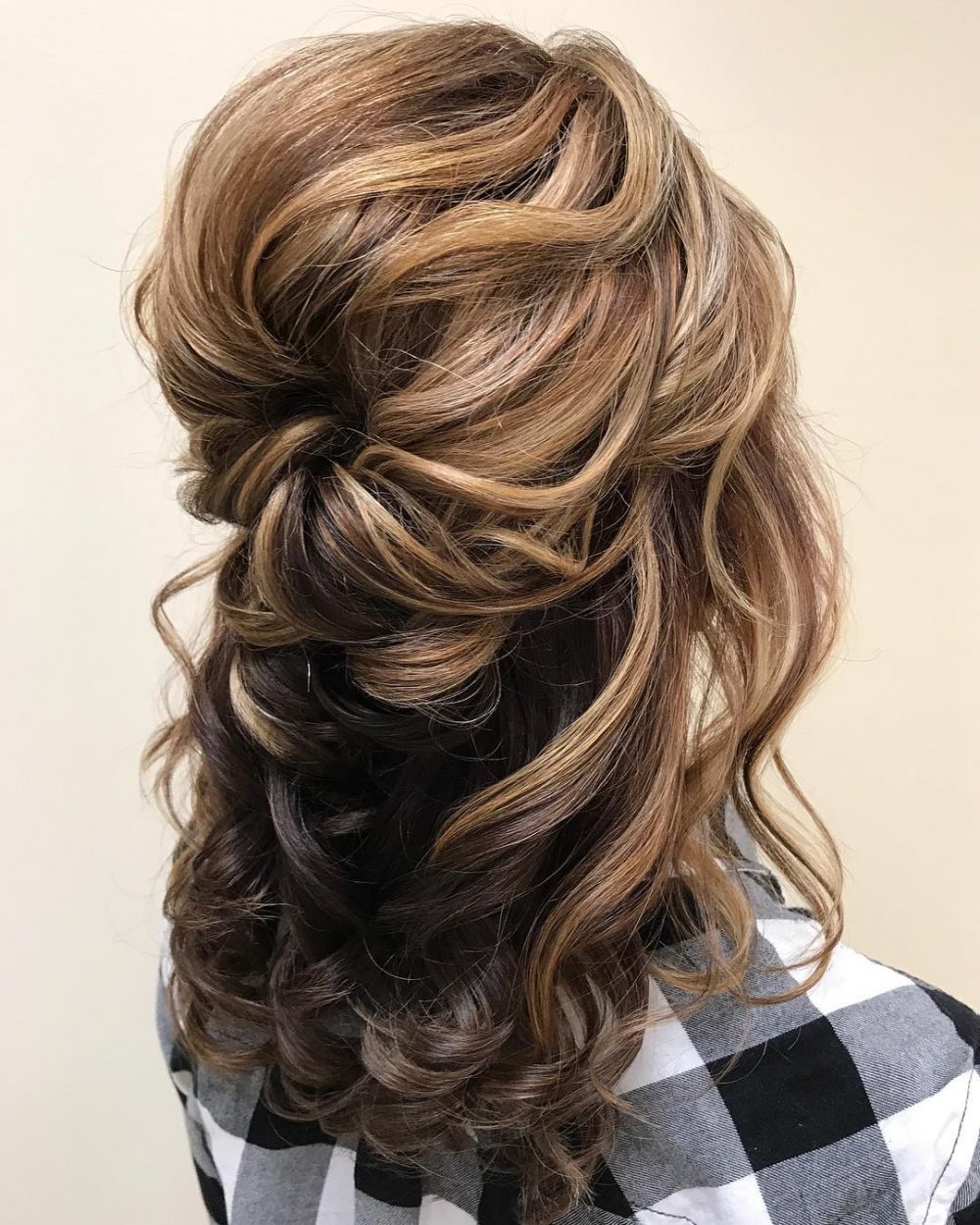 A long half updo with highlights