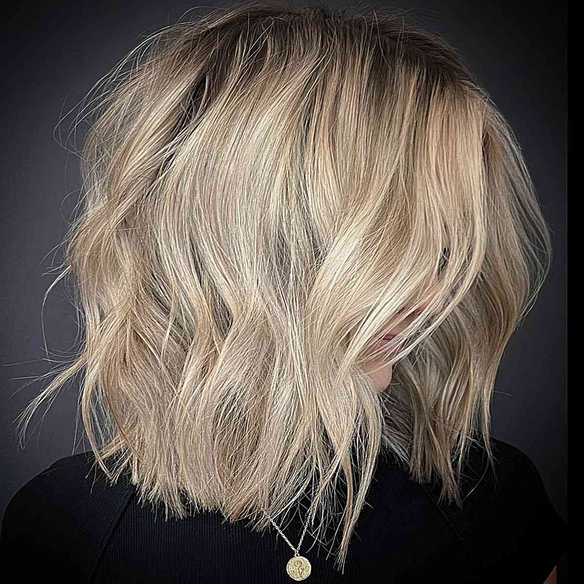 Soft Textured Buttery Blonde with Dark roots and for women with messy hair