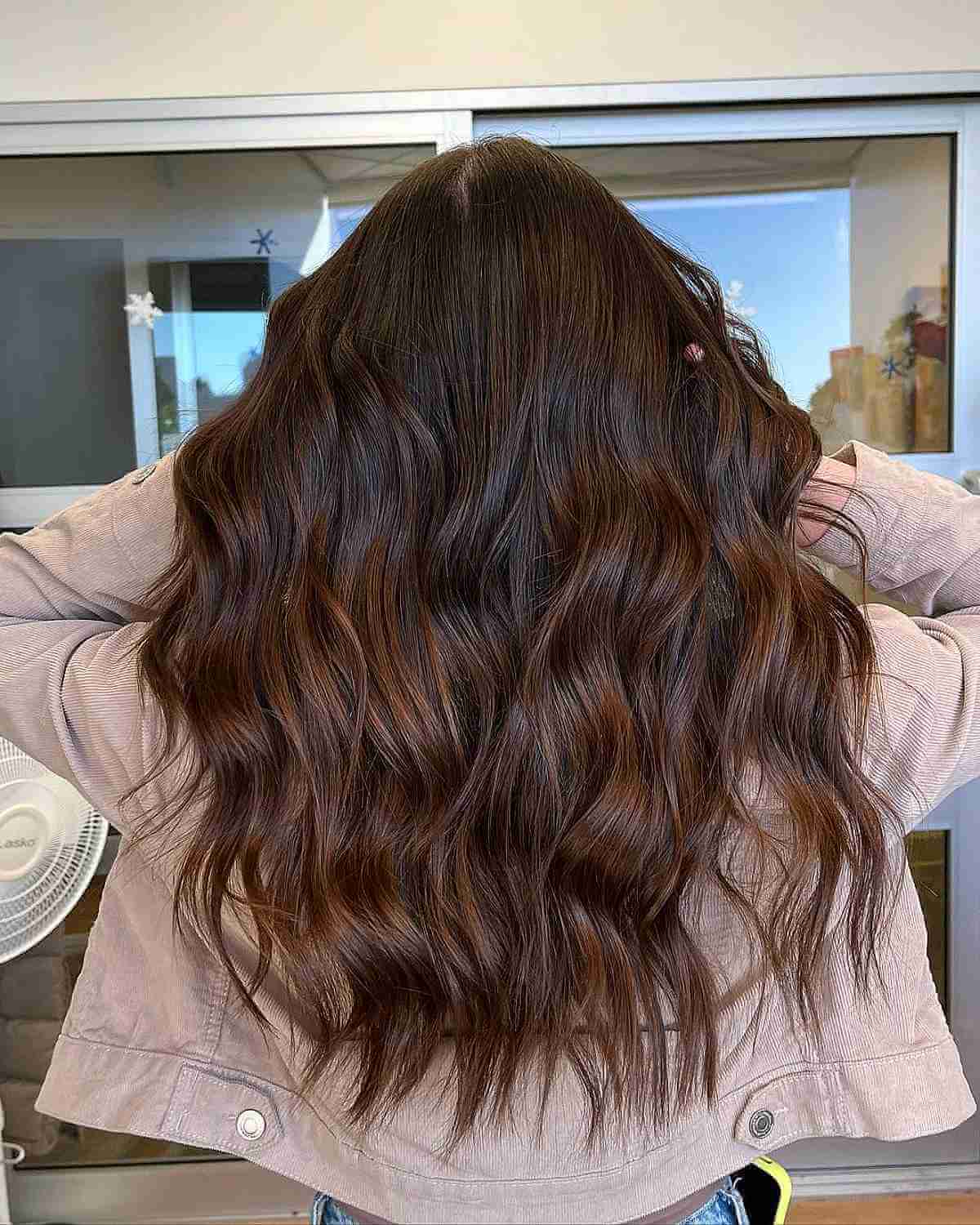 Soft Voluminous Waves on Rich Brown Hair