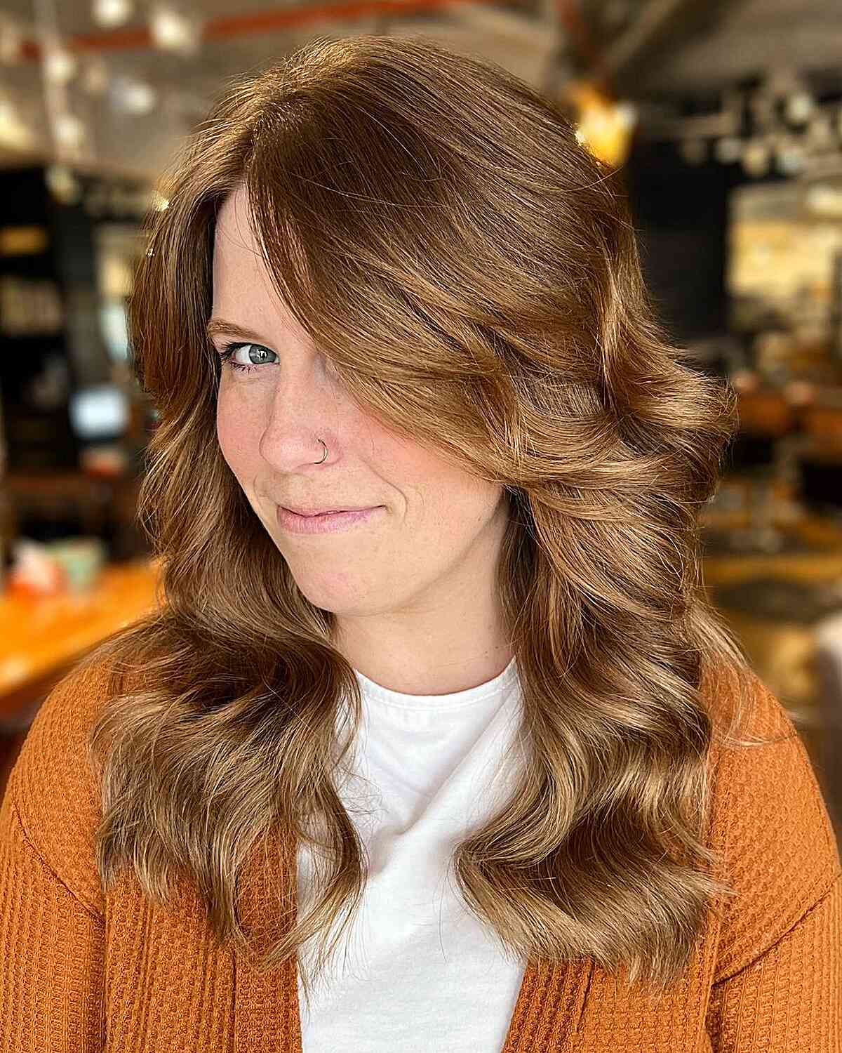 Soft Wavy Medium Layers with Long Bangs for Thick-Haired Ladies with Long Faces