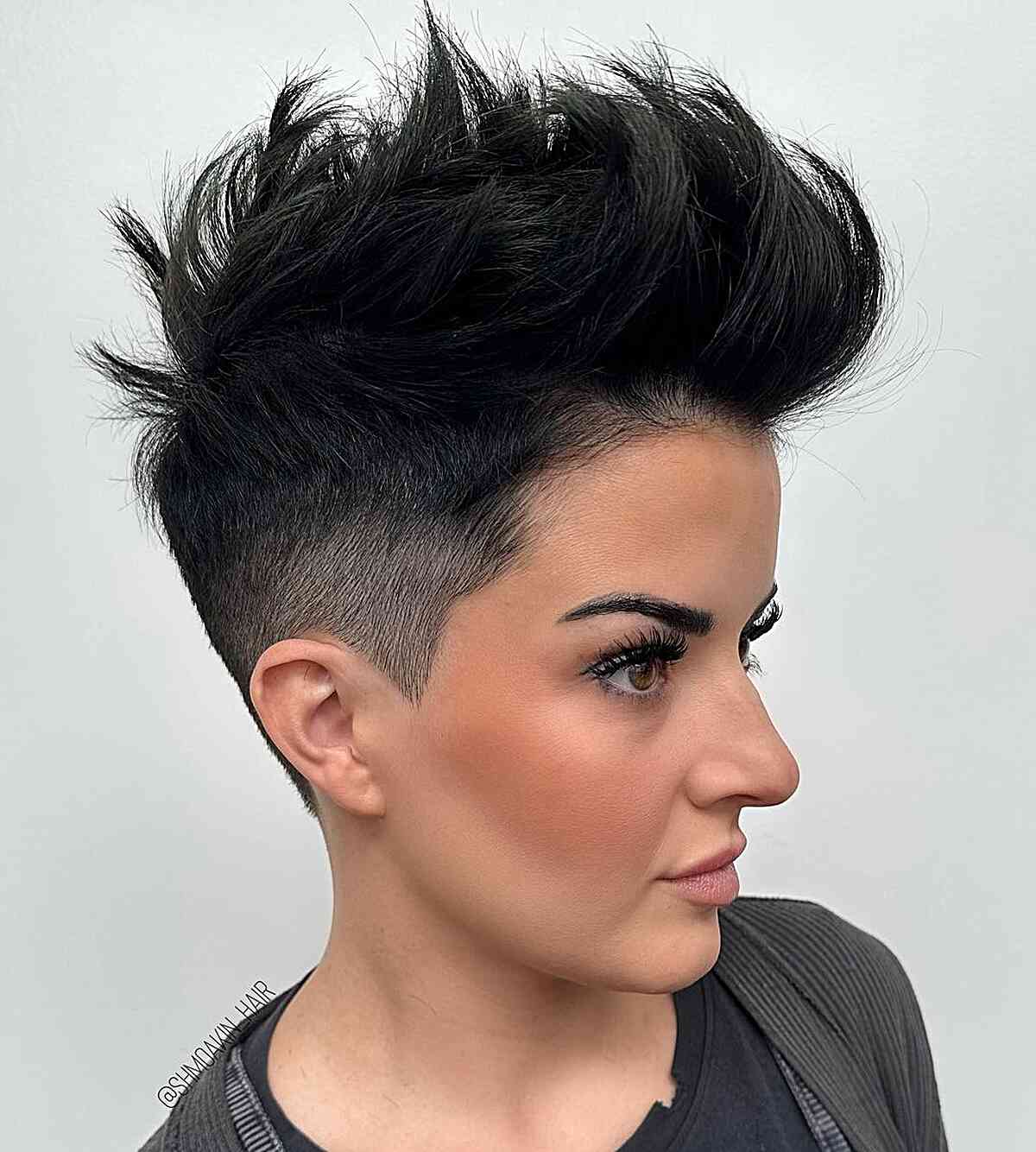 Spiky Edgy Pixie Cut with a Mid Fade for Women with dark short hair
