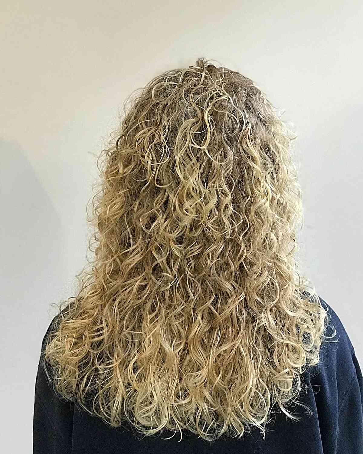 Mid-Long Spiral Permed Hair with Layers