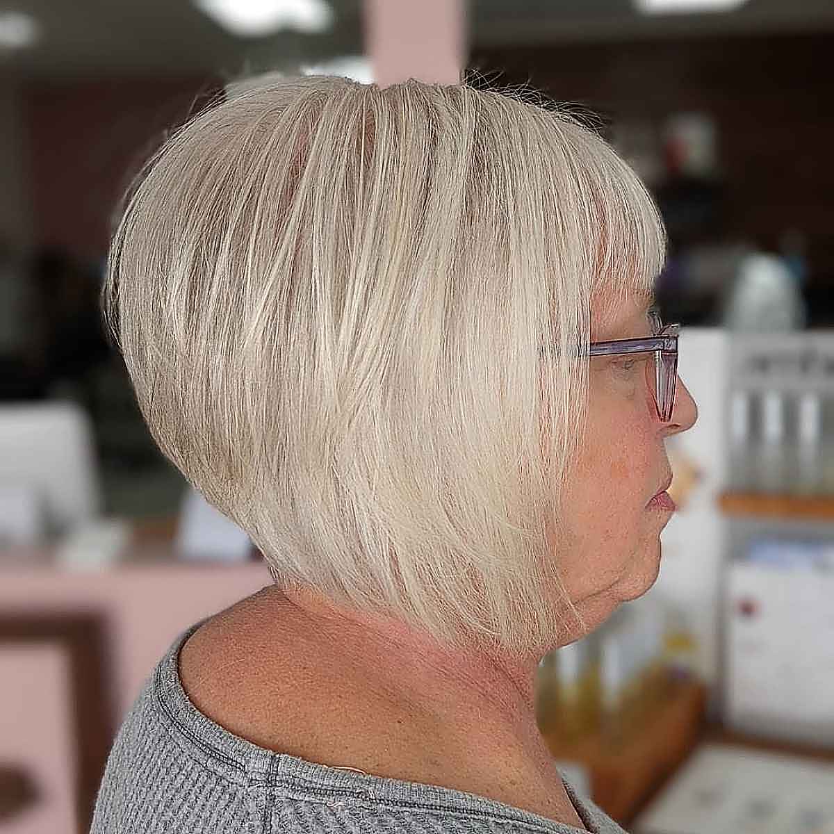 Stacked and Inverted Bob with Bangs for Women in their 60s with fine hair