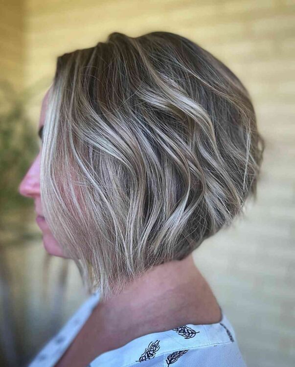 Stacked Angled Wavy Bob With Blonde Highlights 603x750 