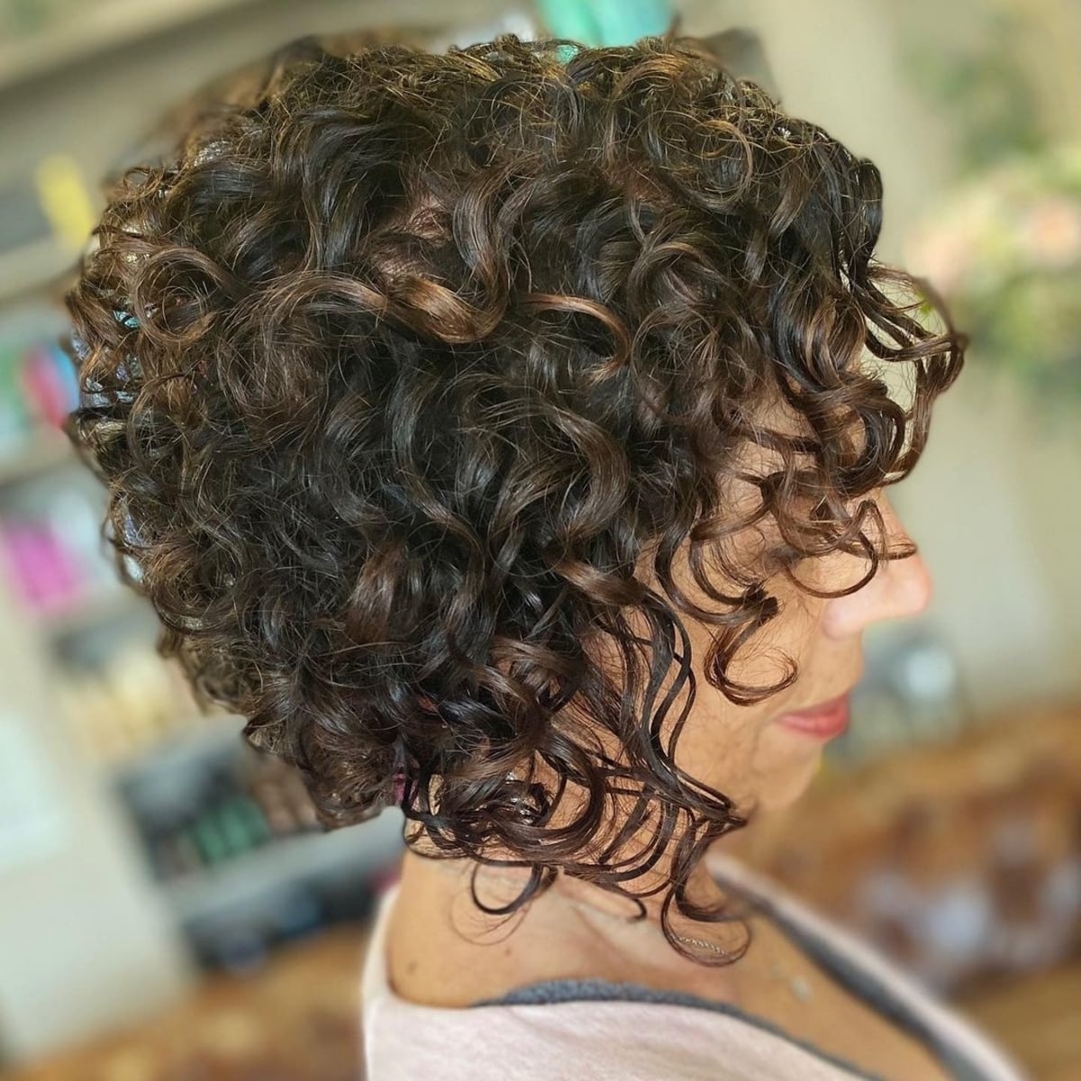 Stacked asymmetrical bob for curly hair