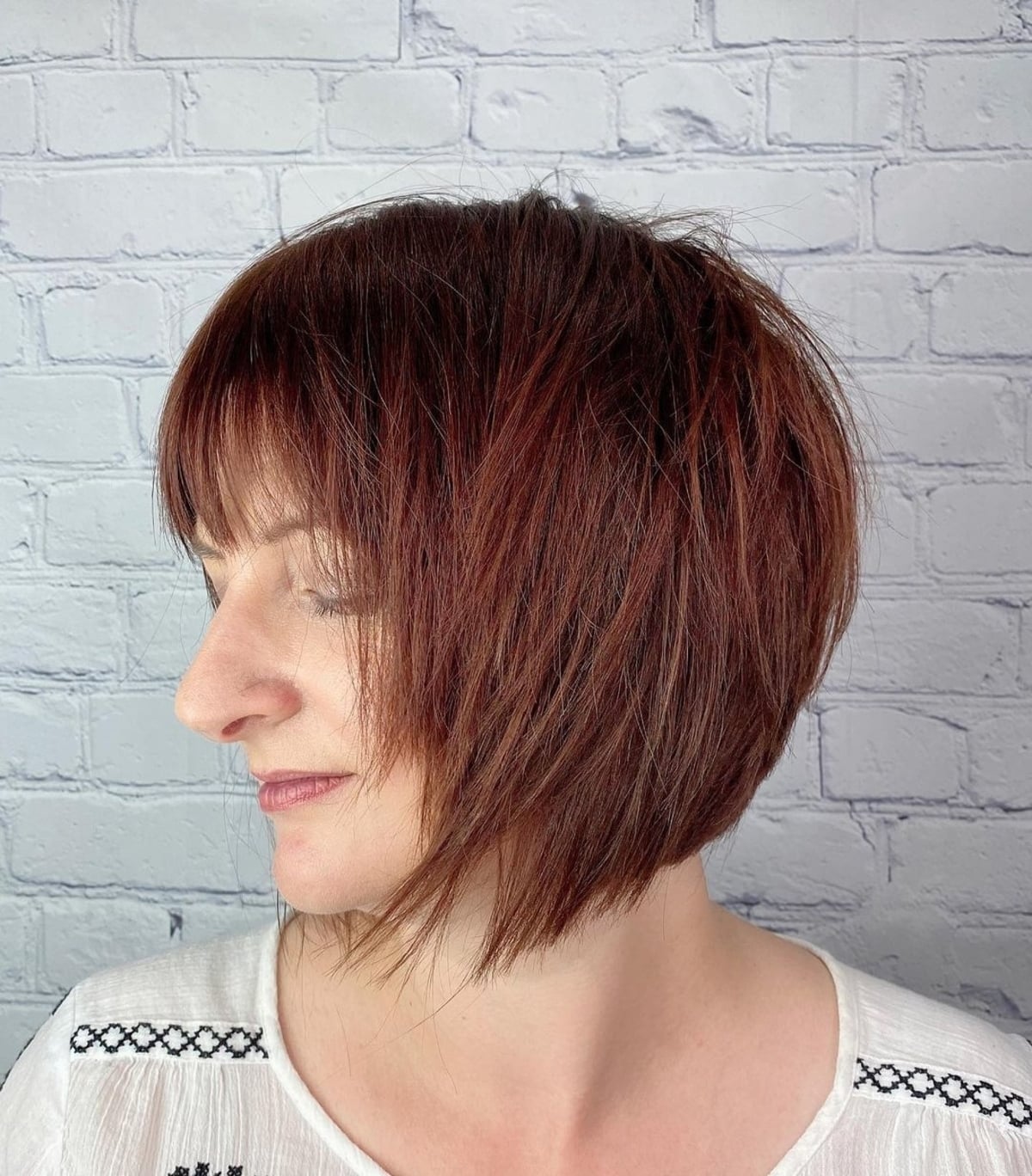 Stacked bob with choppy ends and bangs