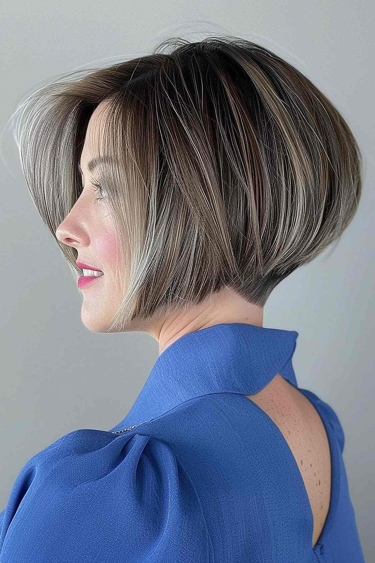 A chin-length bob with a stacked undercut creates a bold, edgy look with plenty of volume.