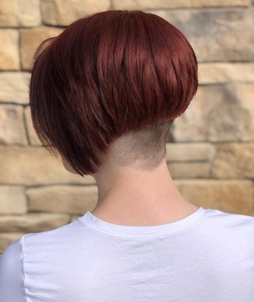 A red undercut stacked bob