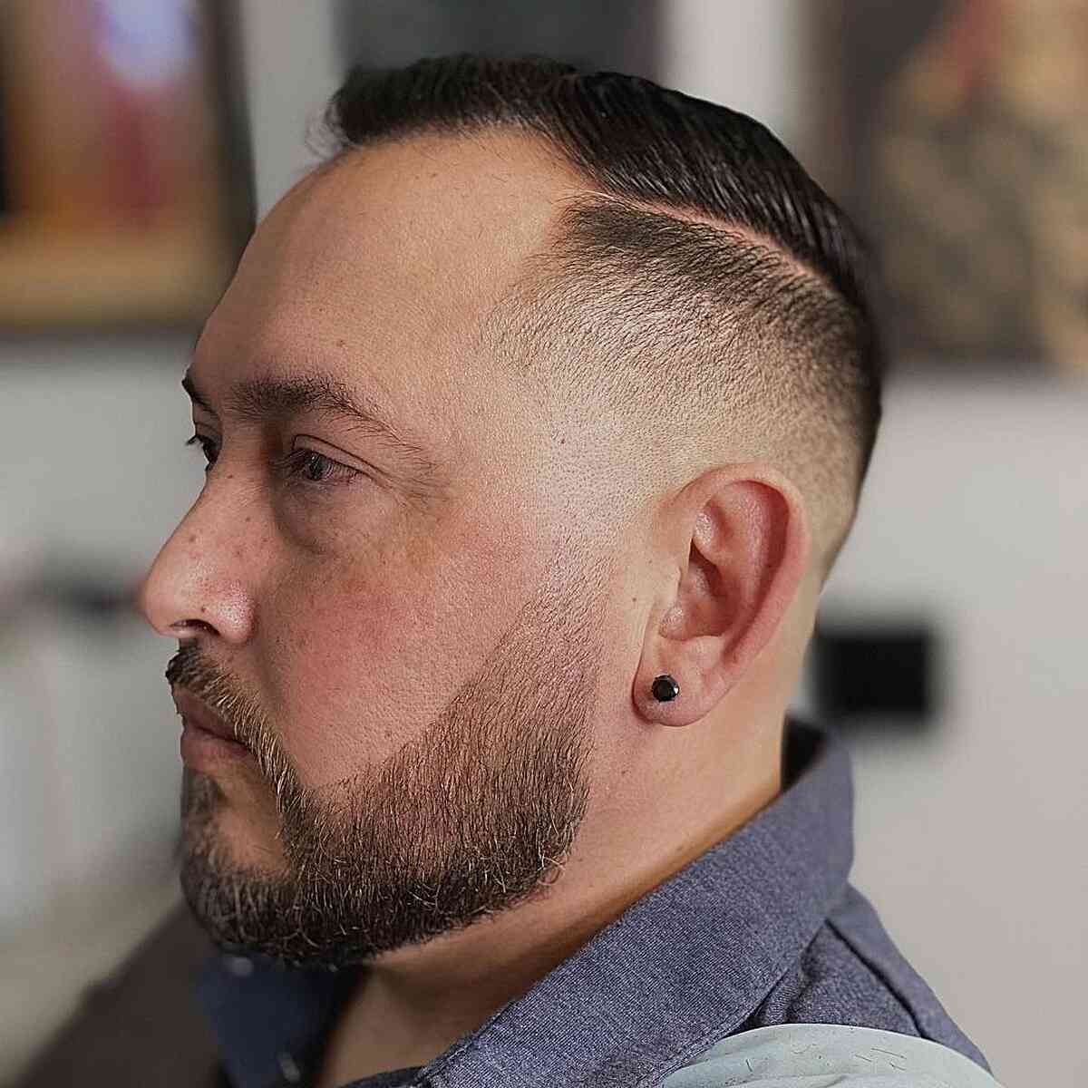 Straight and sleek haircut with a hard part for men with thin hair