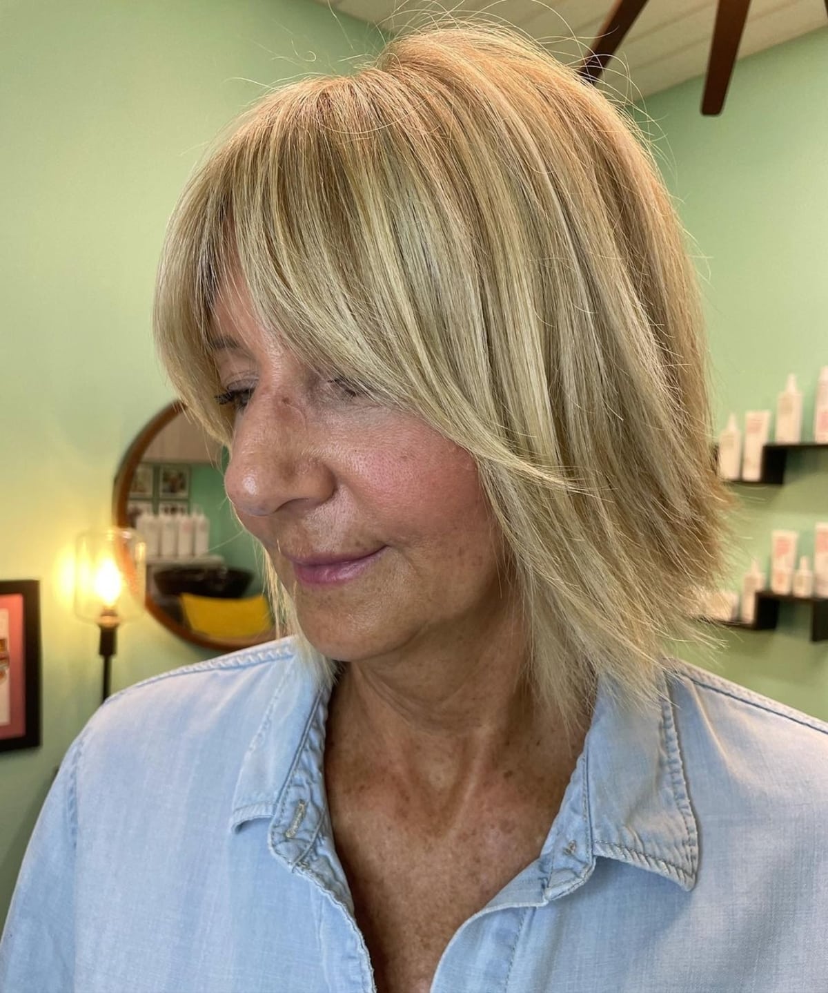 Straight curtain bangs hairstyle for older women